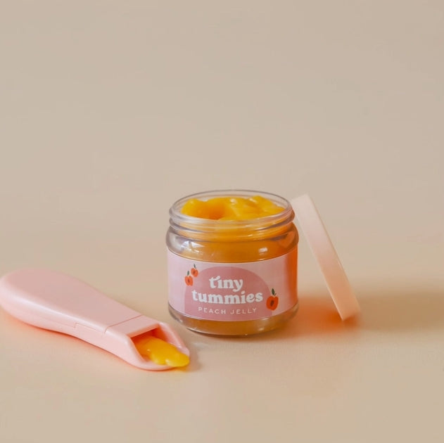 Petit pot avec cuillère pour les poupées — Pêche
