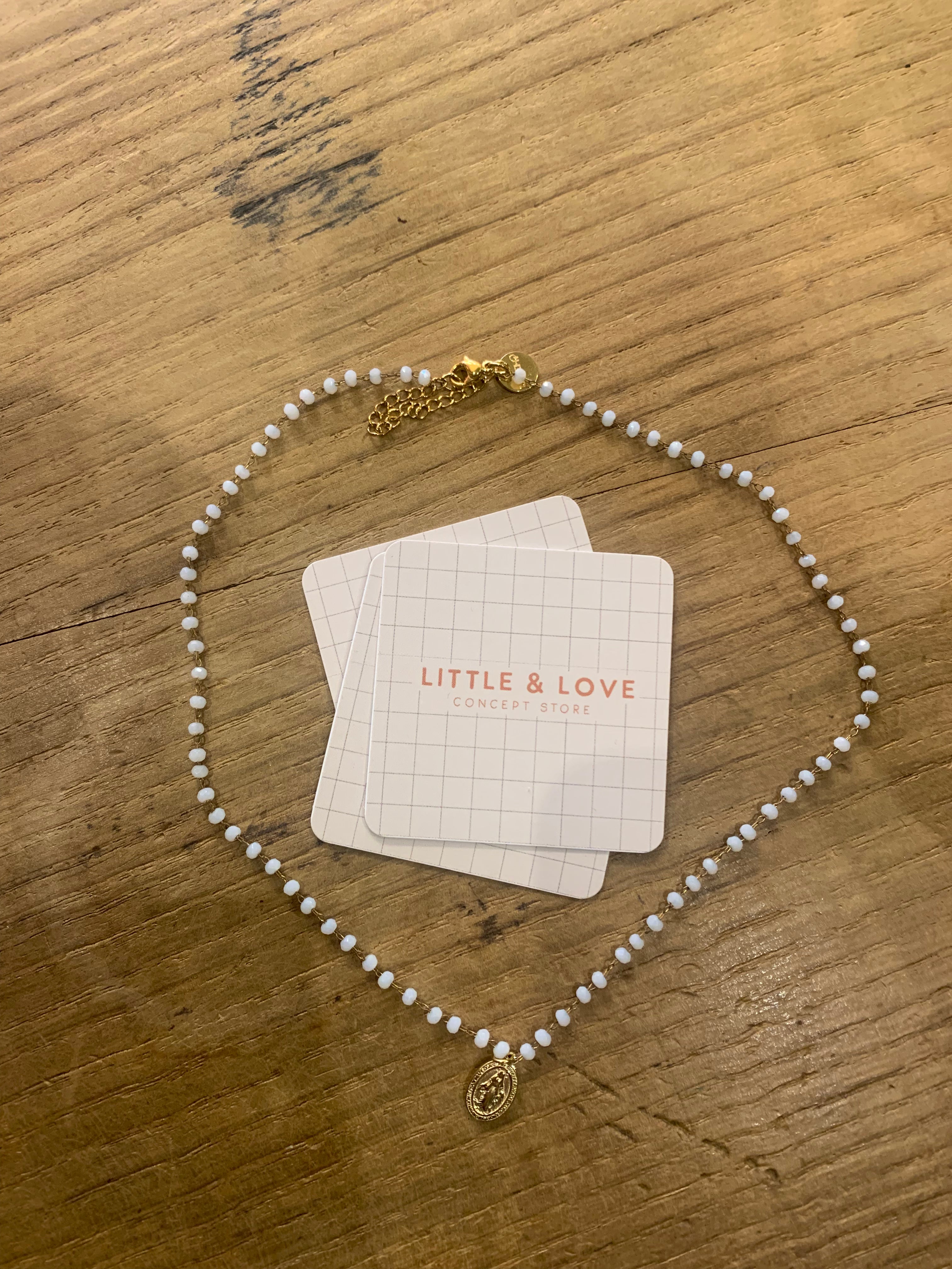 Collier boules blanches et Madone or