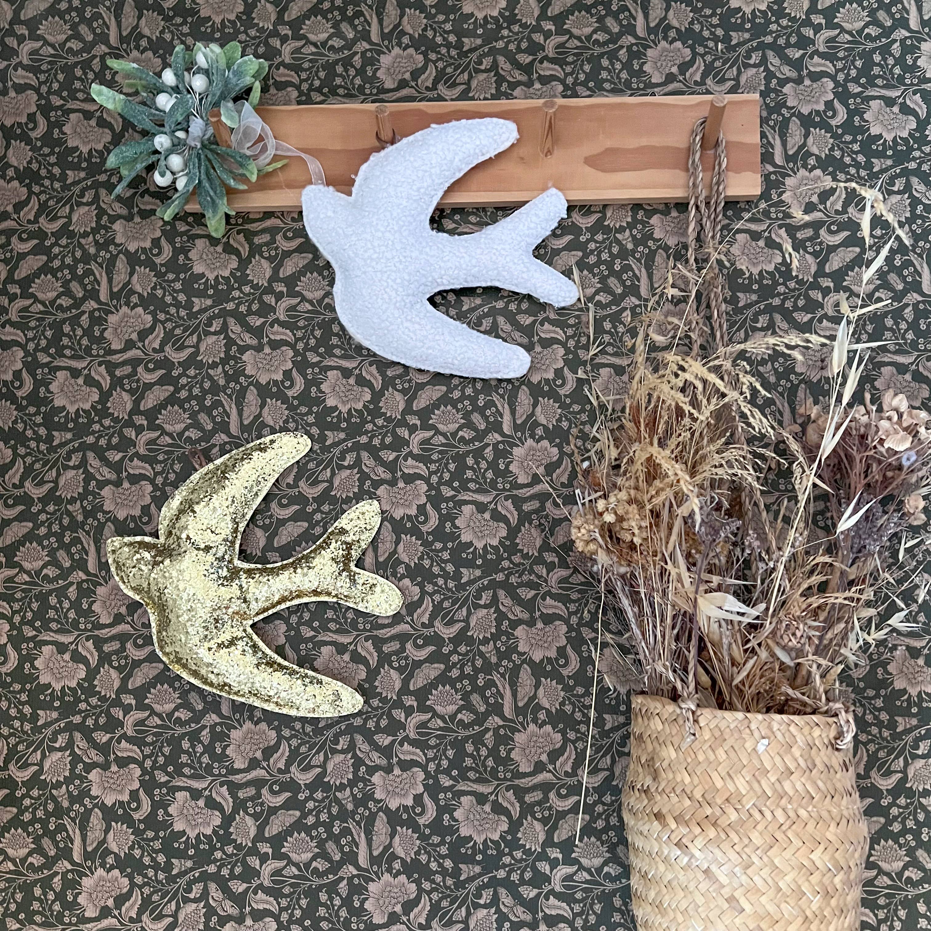 Hirondelle murale à paillettes dorées