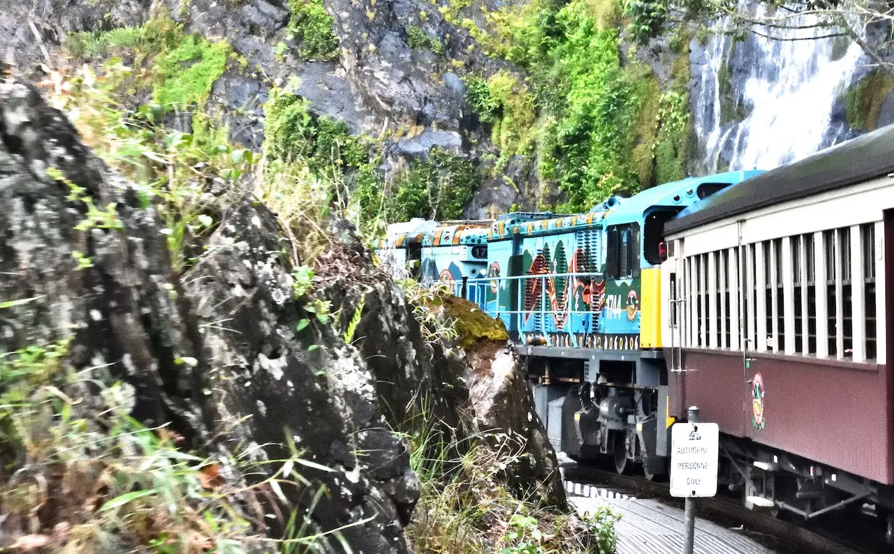 Kuranda Rail passing by waterfalls