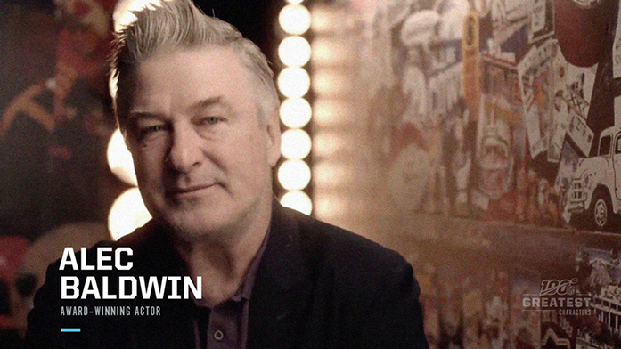Alec Baldwin appears in an NFL100 interview frame with his name and actor credit over archival imagery.