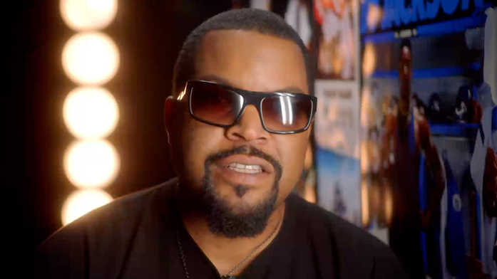 Ice Cube appears in a studio interview frame for NFL100 original programming.