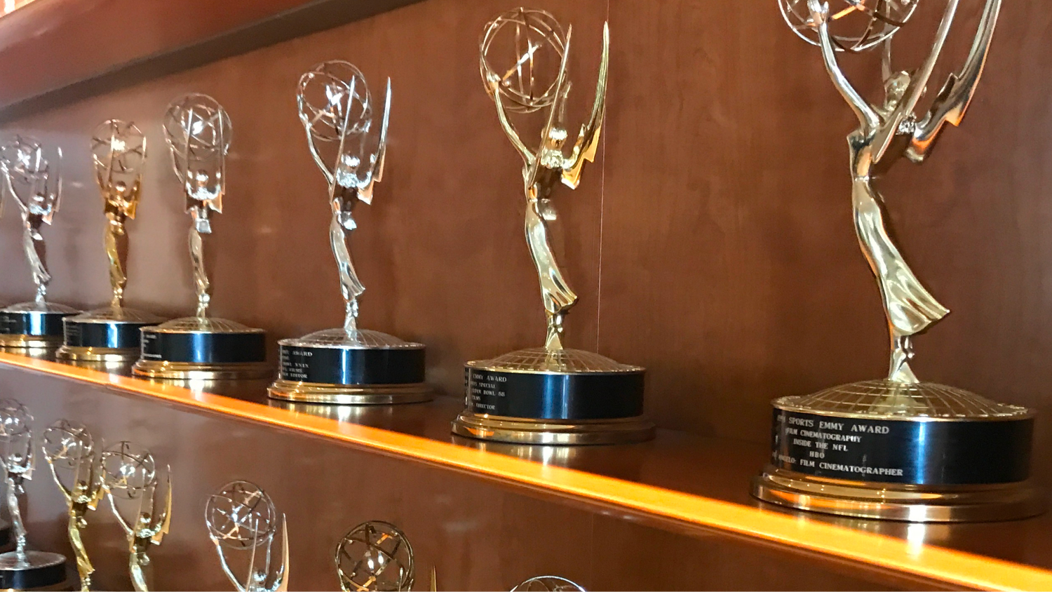 Shelf of Emmy Awards recognizes the NFL storytellers and production teams who shaped the content strategy.