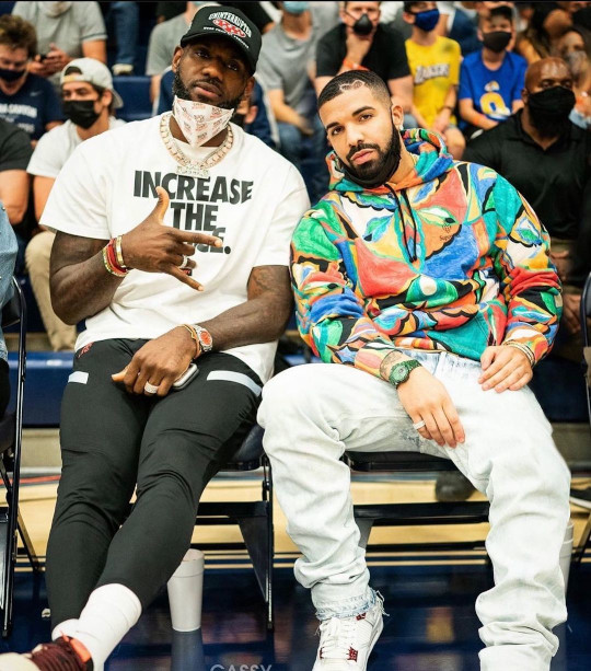 Courtside with Lebron James. Drake sporting the crazy expensive customized Patek Philippe by Louis Vuitton Artistic Director Virgil Abloh