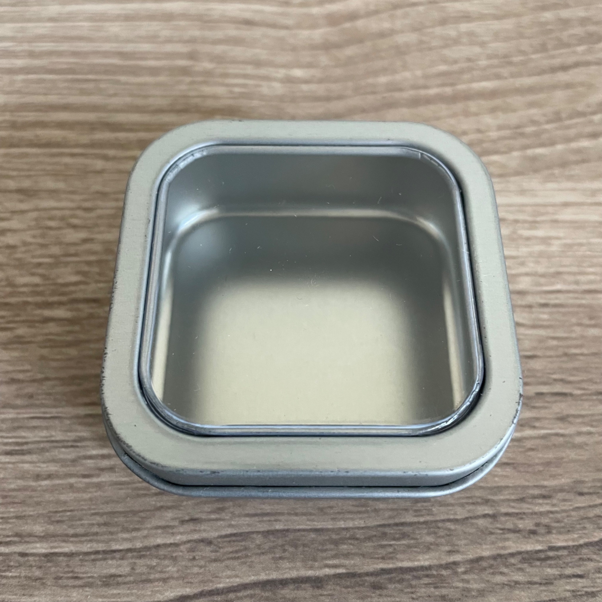 Silver square cube shallow window top tin container 2 oz