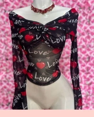 Blusa de mesh estampado Love con nudo y manga larga