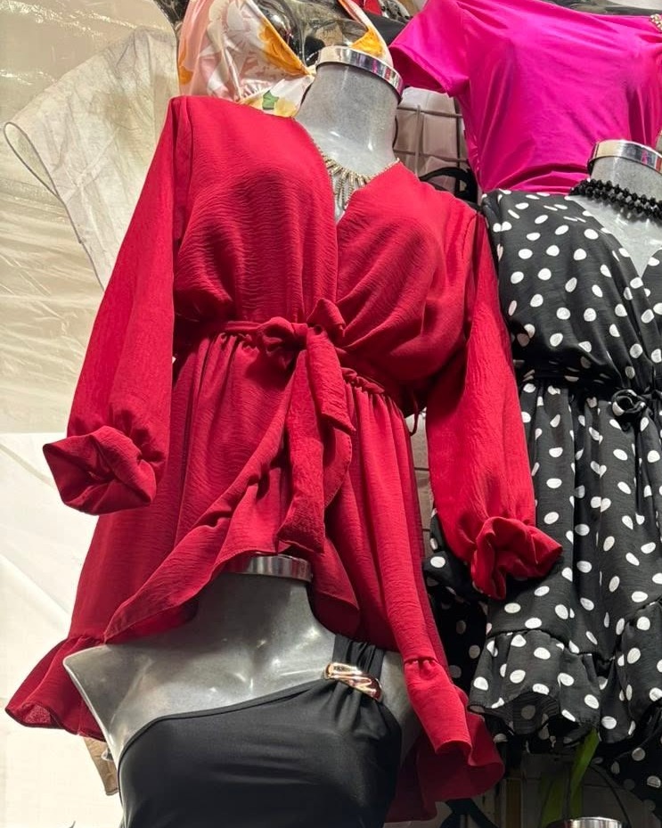 Blusa cruzada con moño y manga larga acampanada