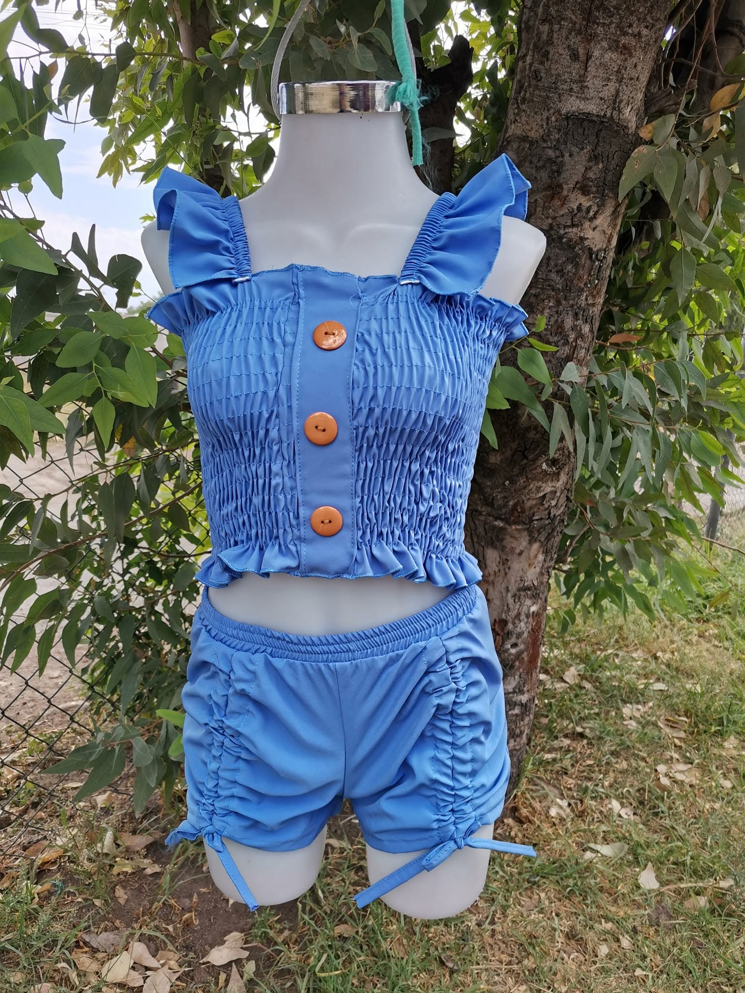 Conjunto de niña top fruncido con short de jaretas