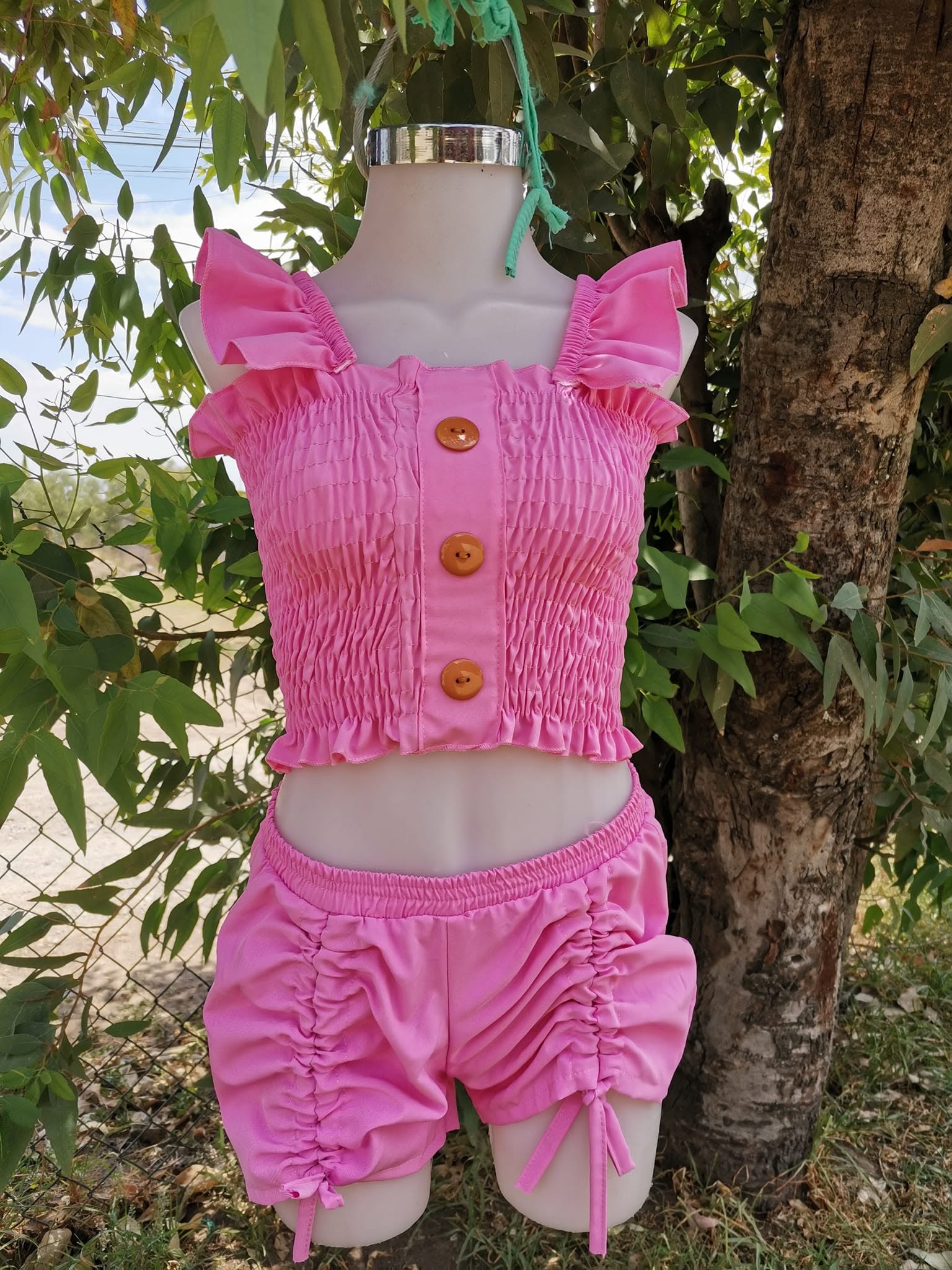 Conjunto de niña top fruncido con short de jaretas