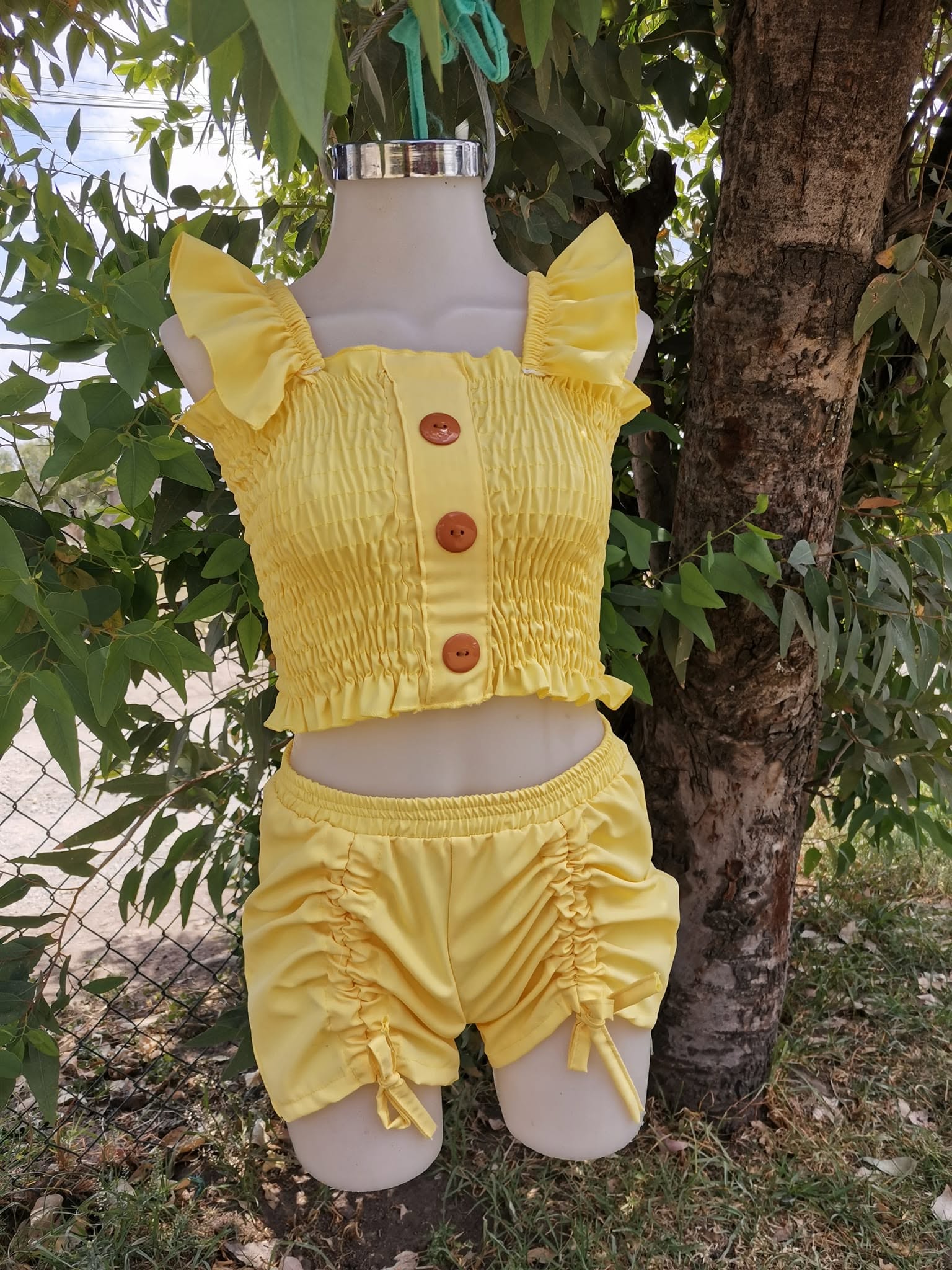 Conjunto de niña top fruncido con short de jaretas