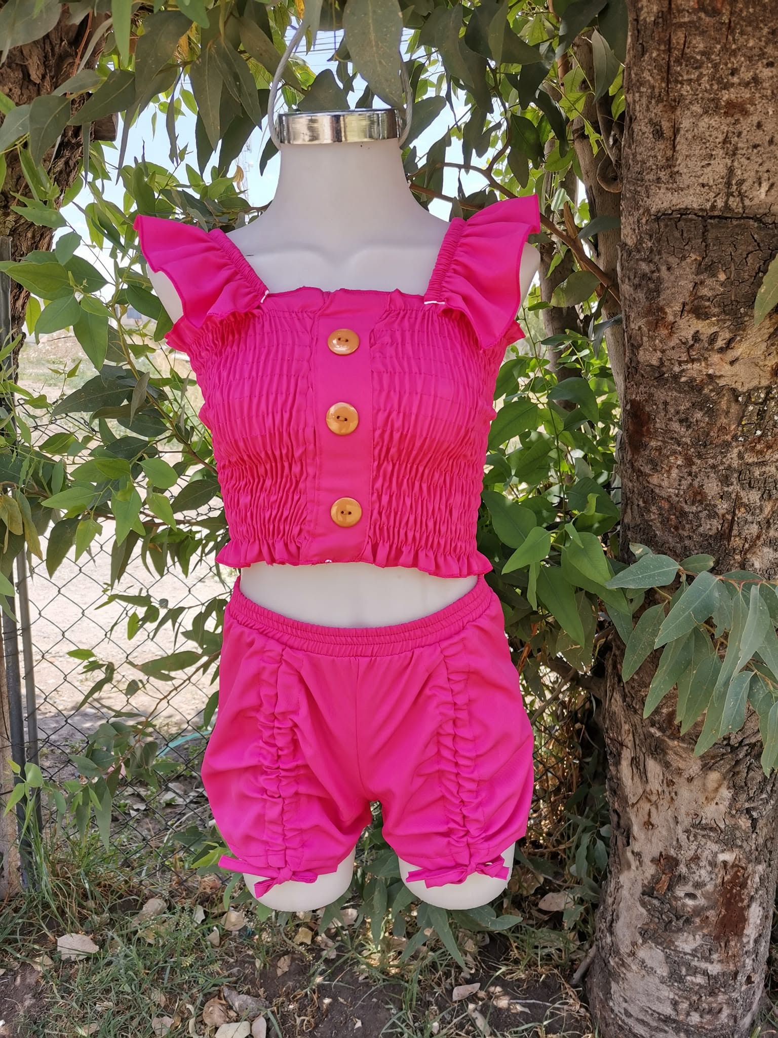 Conjunto de niña top fruncido con short de jaretas