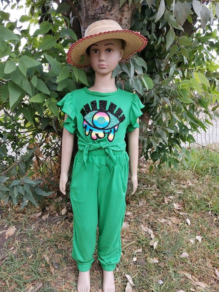 Conjunto de niña playera con ojo de lentejuelas y pantalón jogger