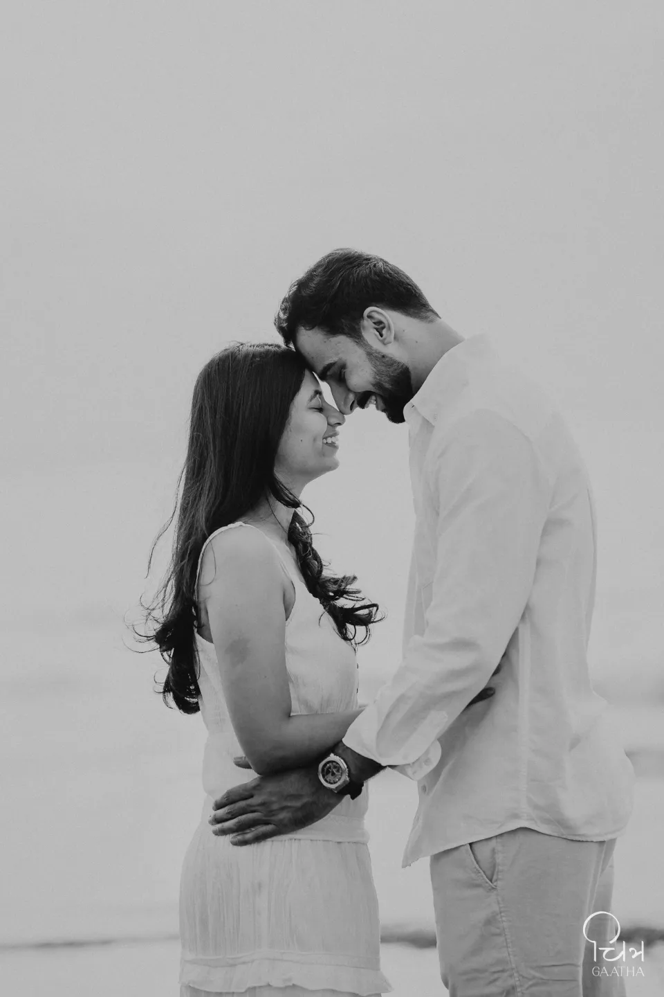 Couple embracing in warm sunlight
