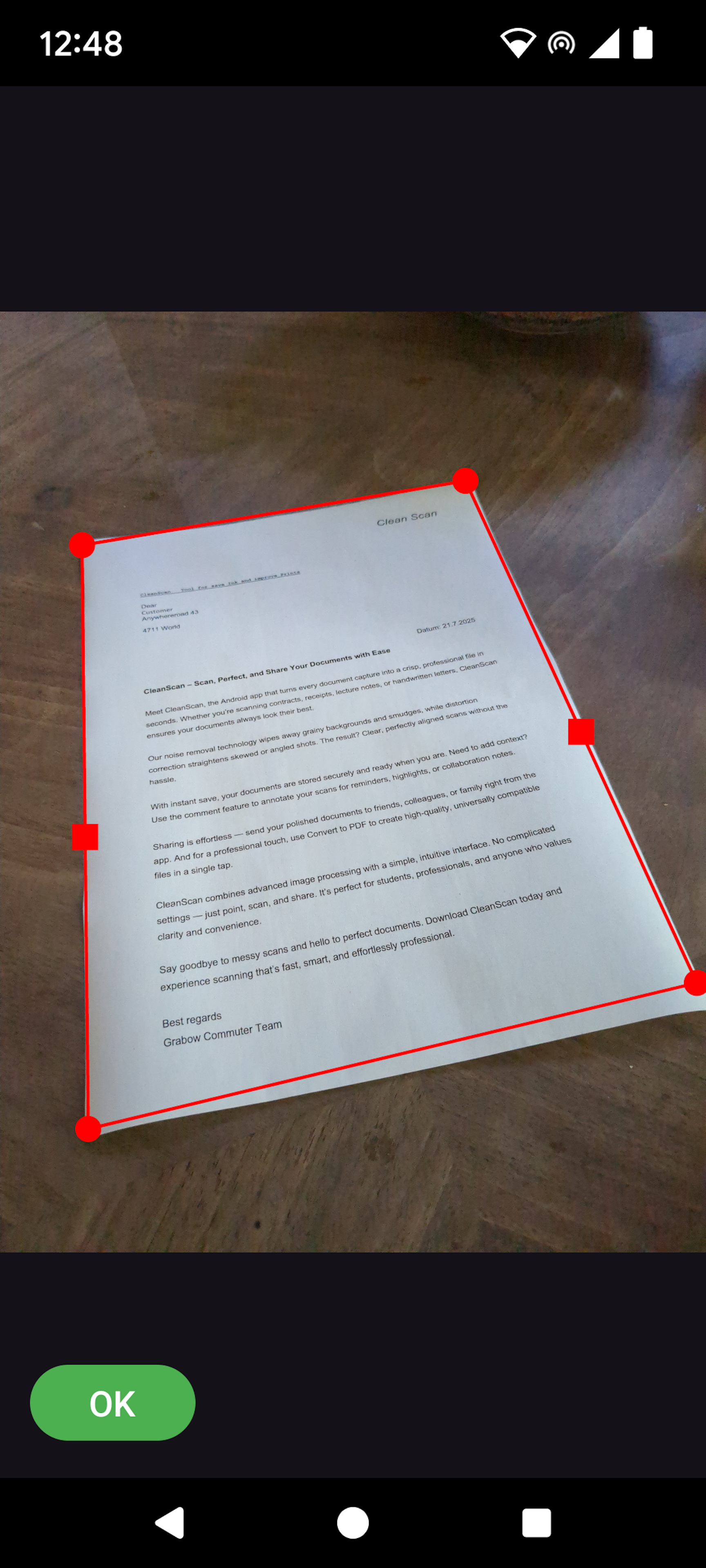 Step 1: A person capturing a document with their phone.