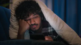 Satire: Self-Treating ADHDer Rescued After Spending a Week Trapped Under Weighted Blankets
