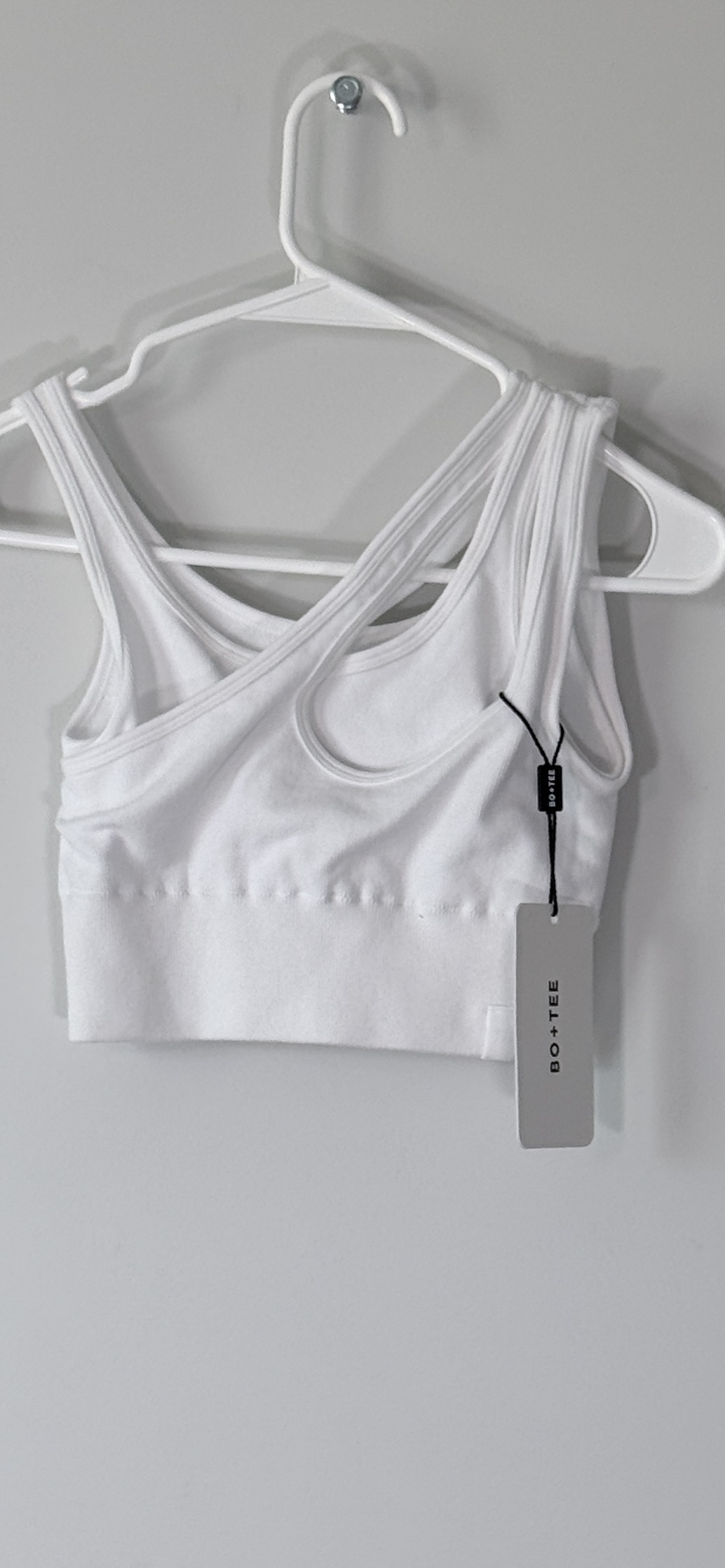 Bo+Tee Seamless Soft Rib Asymmetric Sports Bra in White thumbnail 2