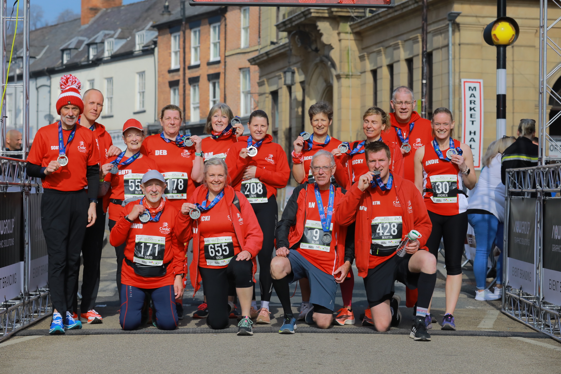 A friendly group of runners outdoors