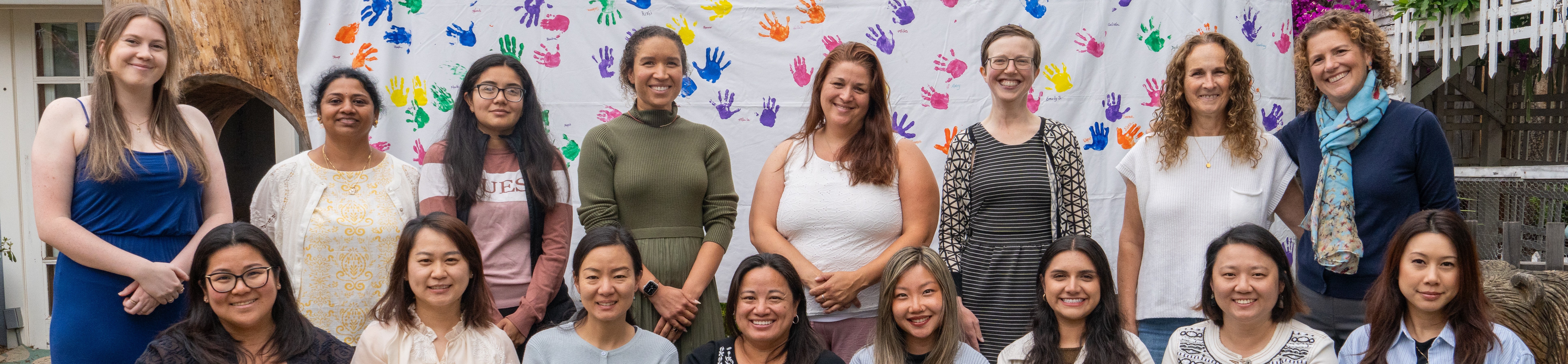 Hero image for the teachers page showing a diverse group of guides smiling.