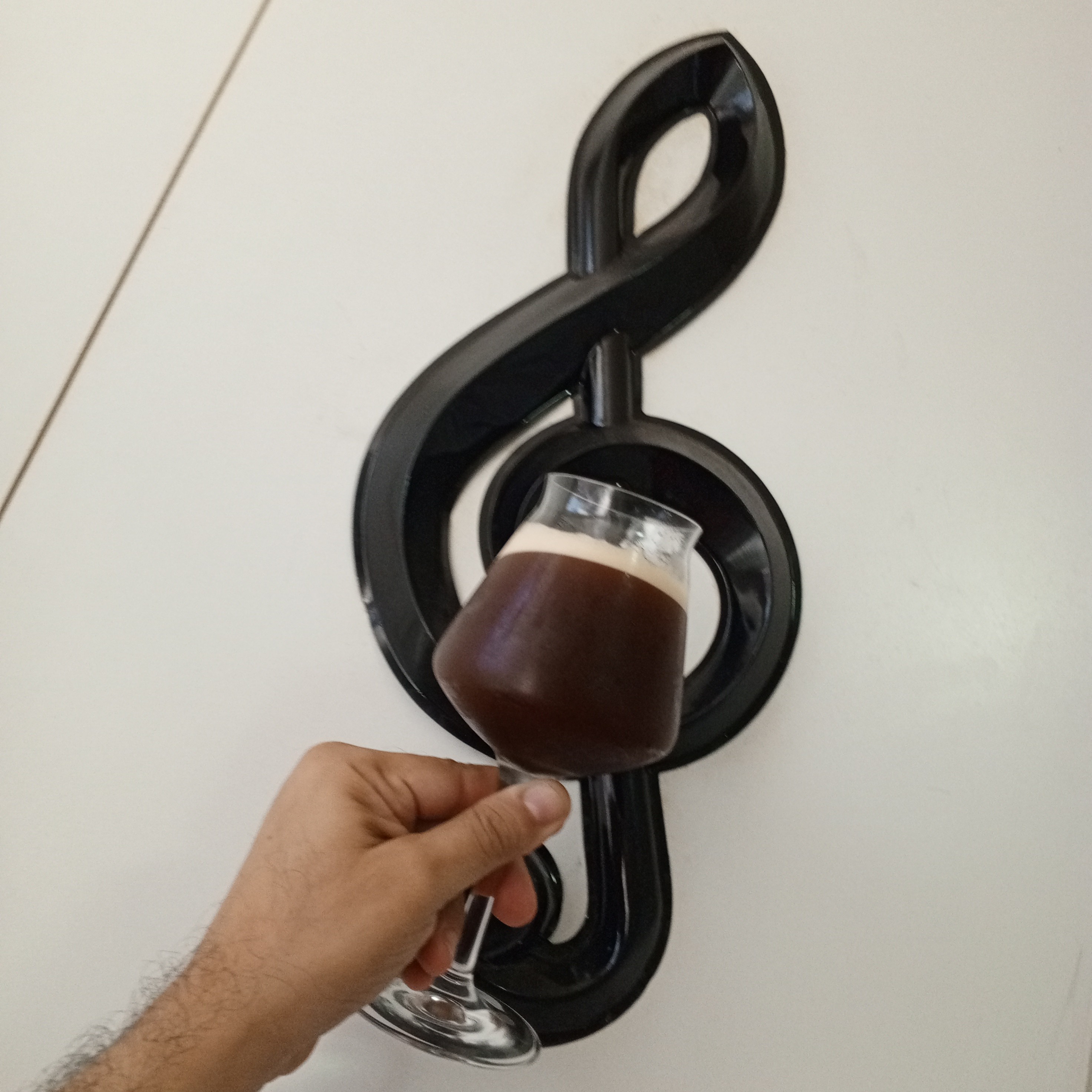 One of my favorite vessels to serve coffee is this Teku glass. It is mainly designed to enhance the aromas and flavors of beer. It's curved and widens upward, with a beveled-out thin lip at the top. Its tulip shape allows a foamy head to form (mostly applicable to beer), which releases aroma compounds (reason why I like it for specialty coffee).

Do you have one? Highly recommended.