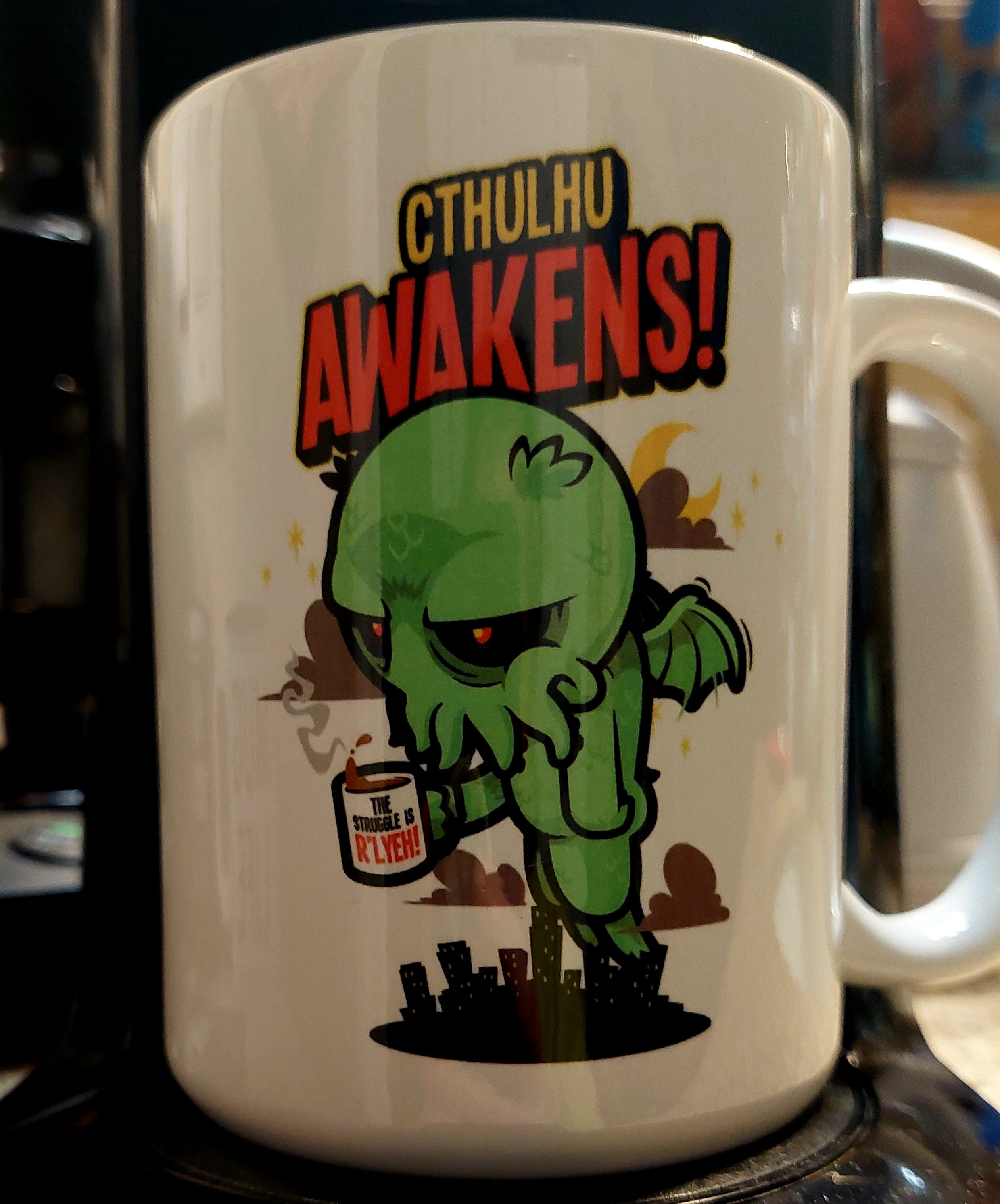 ☕️ MUG COLLECTION ☕️
Cthulhu Awakens!
Cthulhu is holding a coffee mug that says
