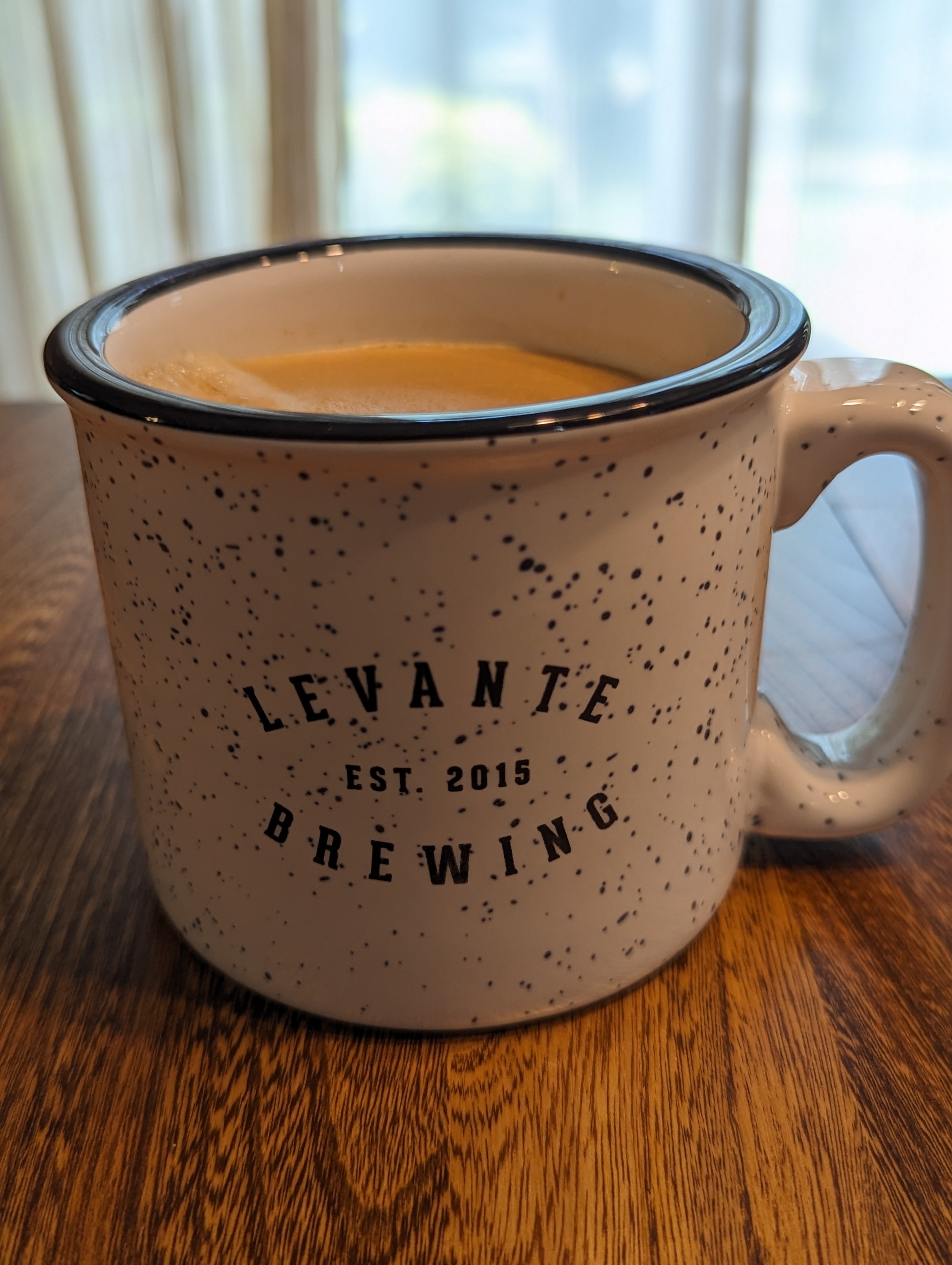 Drinking some coffee with an extra boost of caffeine before a busy night