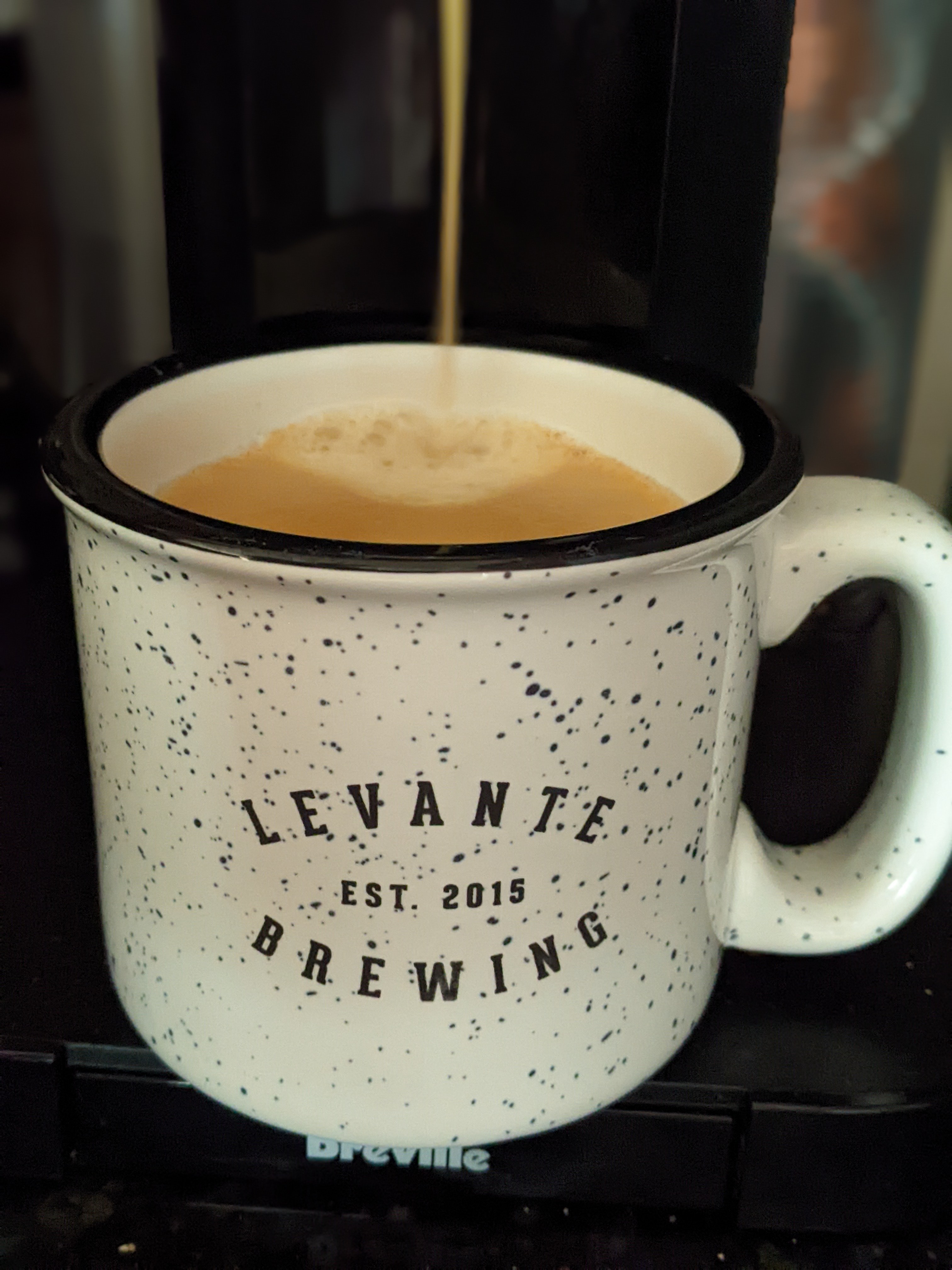 Drinking some coffee with extra caffeine in preparation for the next meeting