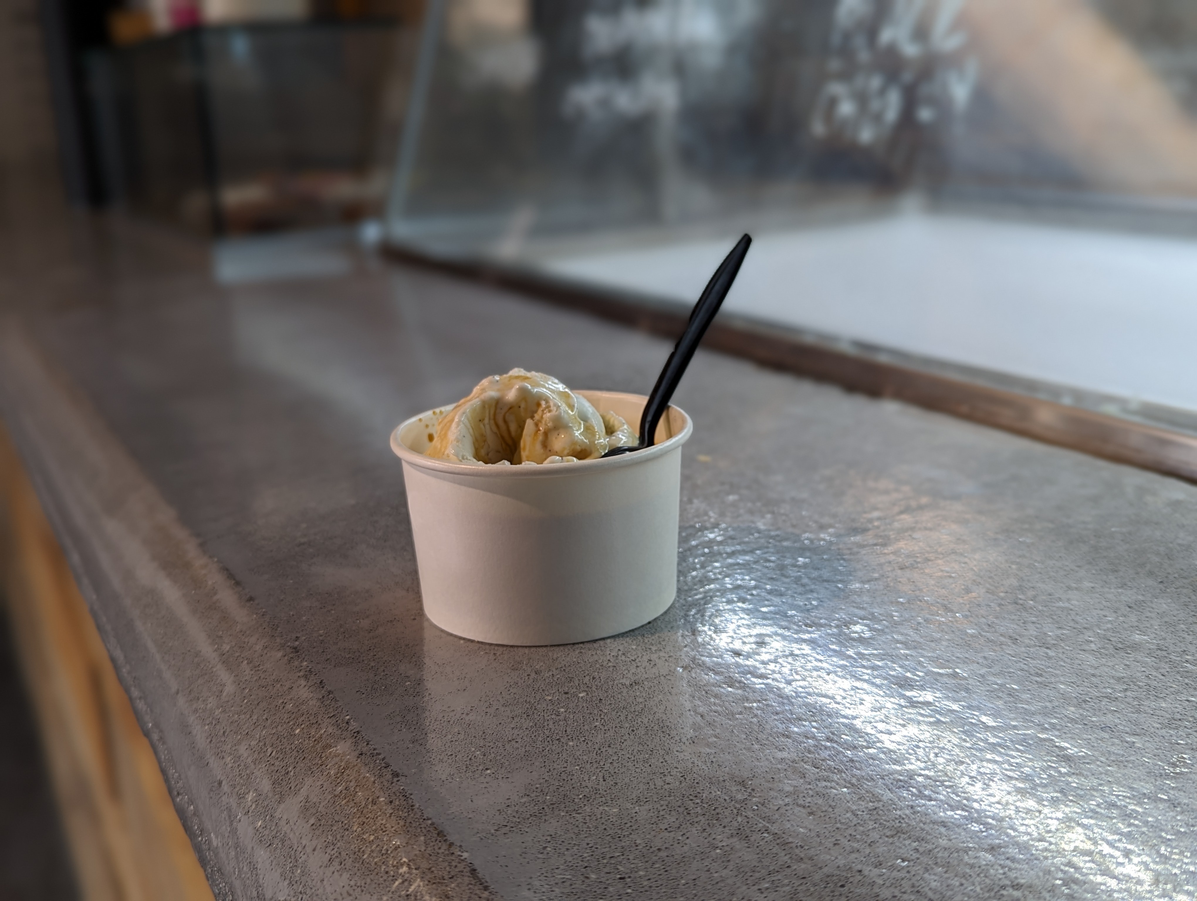 Having an affogato (vanilla ice cream with a double espresso)