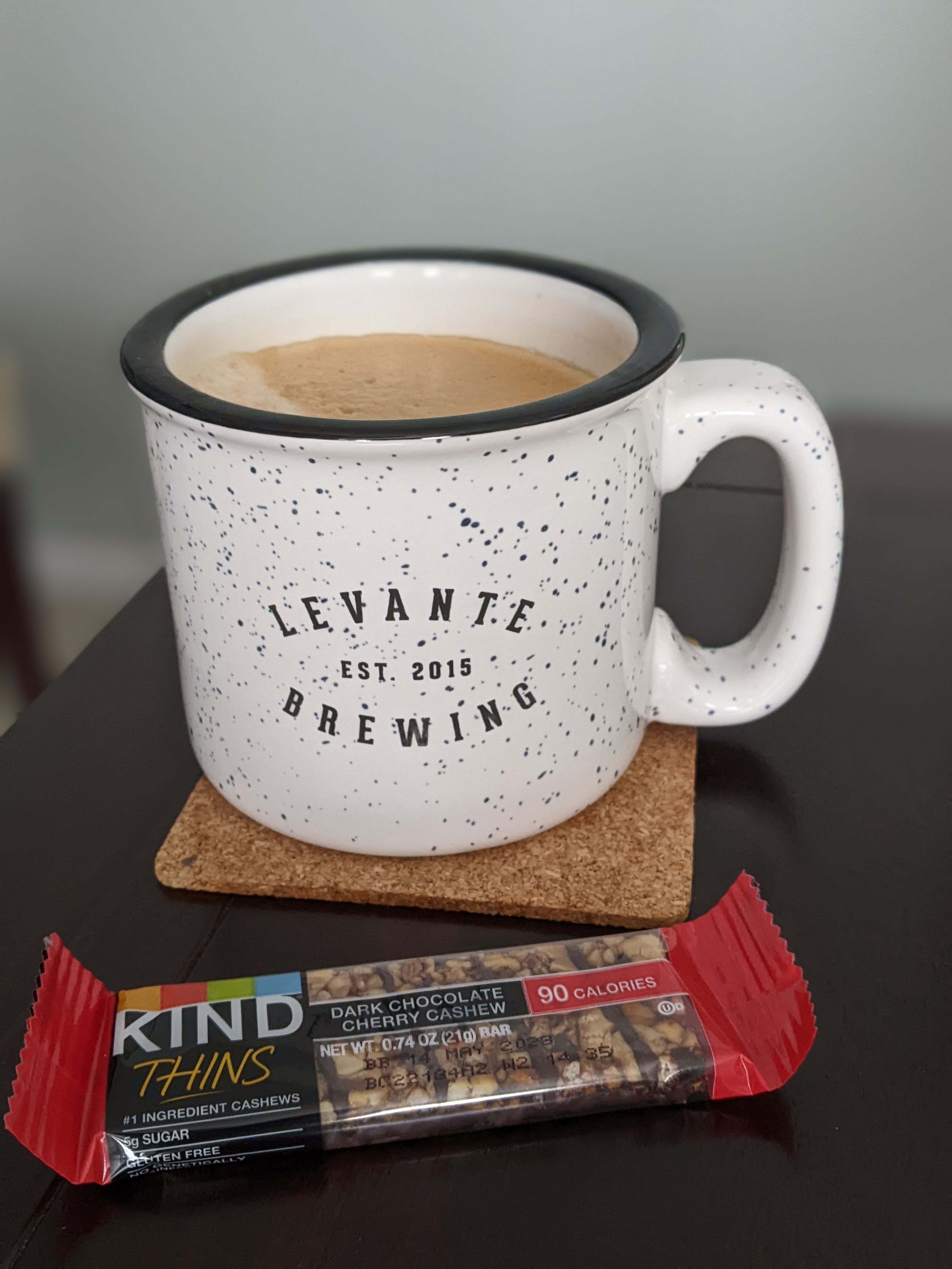 Having a Kind breakfast bar with a great coffee with extra caffeine to make it through morning meetings