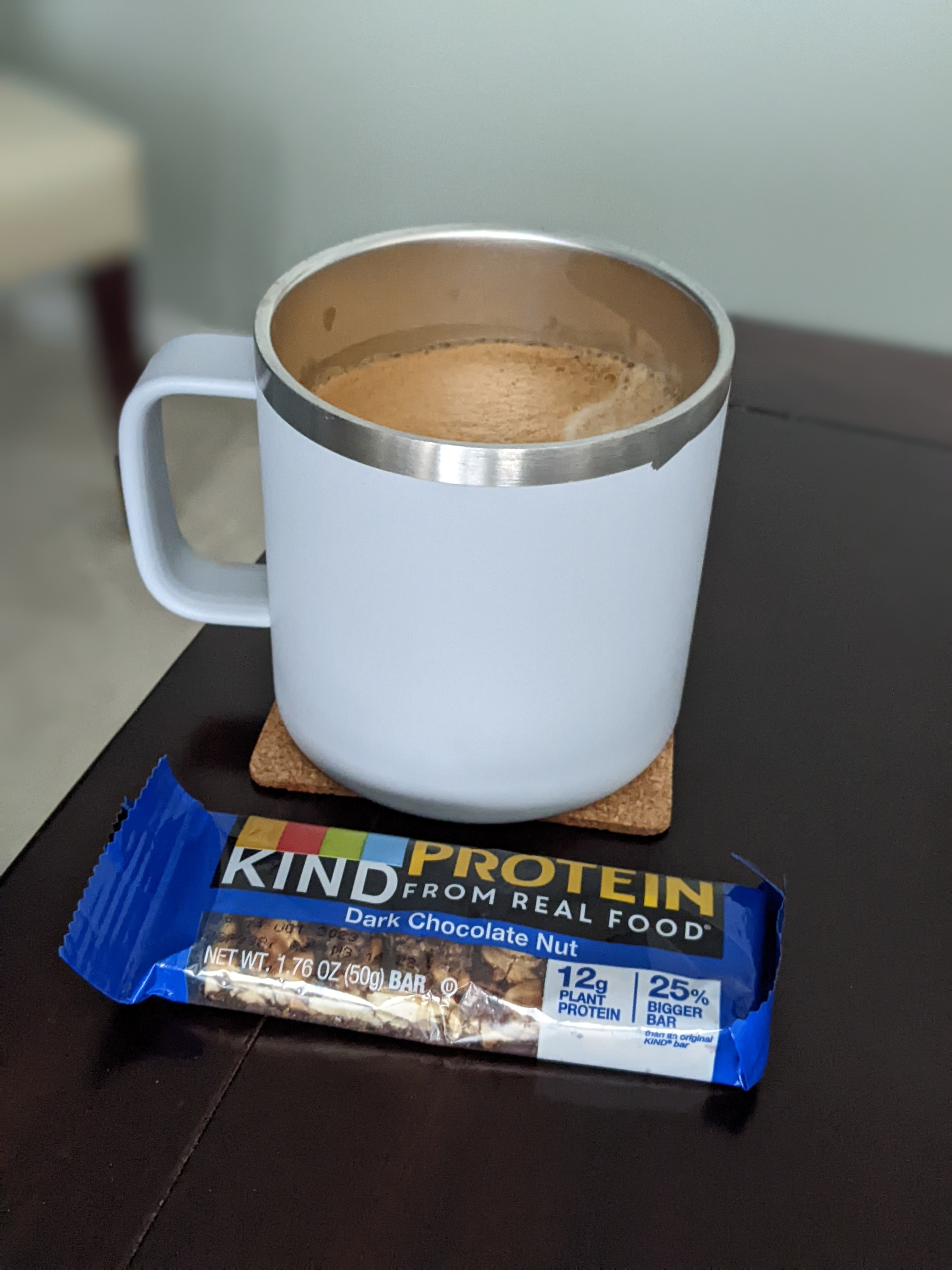 Having a coffee with a breakfast bar before a morning of meetings