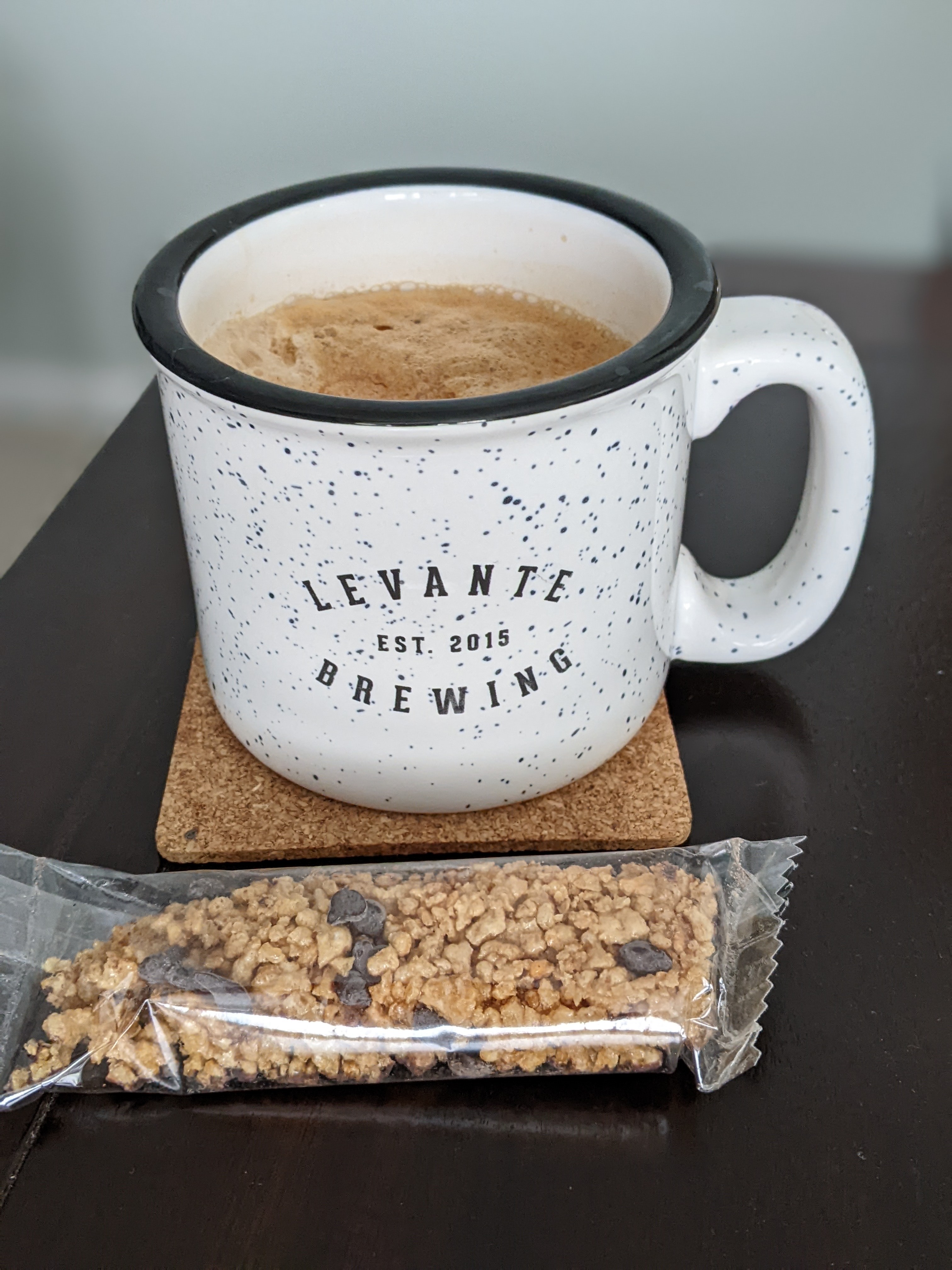 Drinking a favorite (not a doppio :( ) with a breakfast bar from Italy before the next meeting