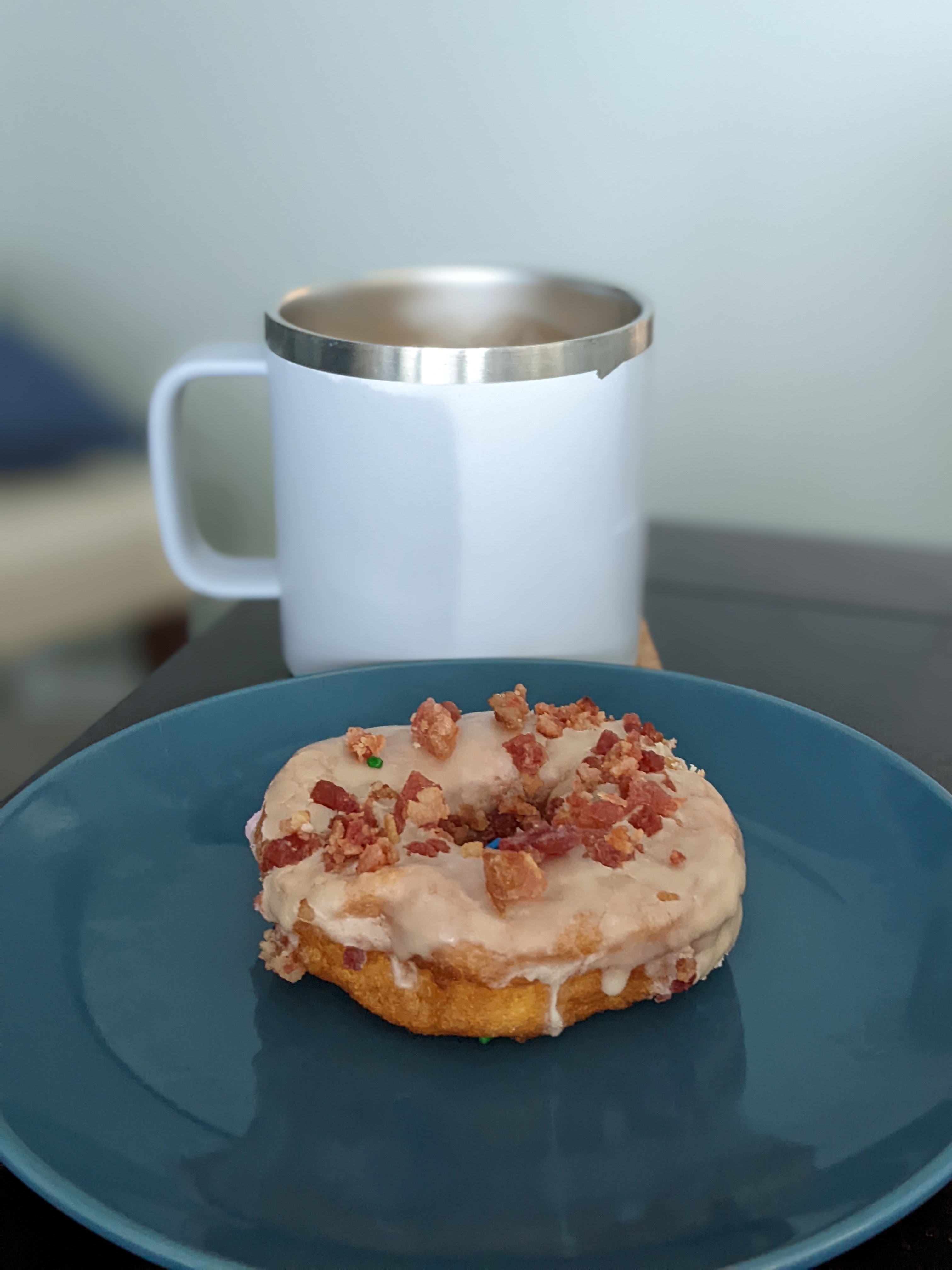 Enjoying the last maple bacon donut and coffee before a bunch of meetings