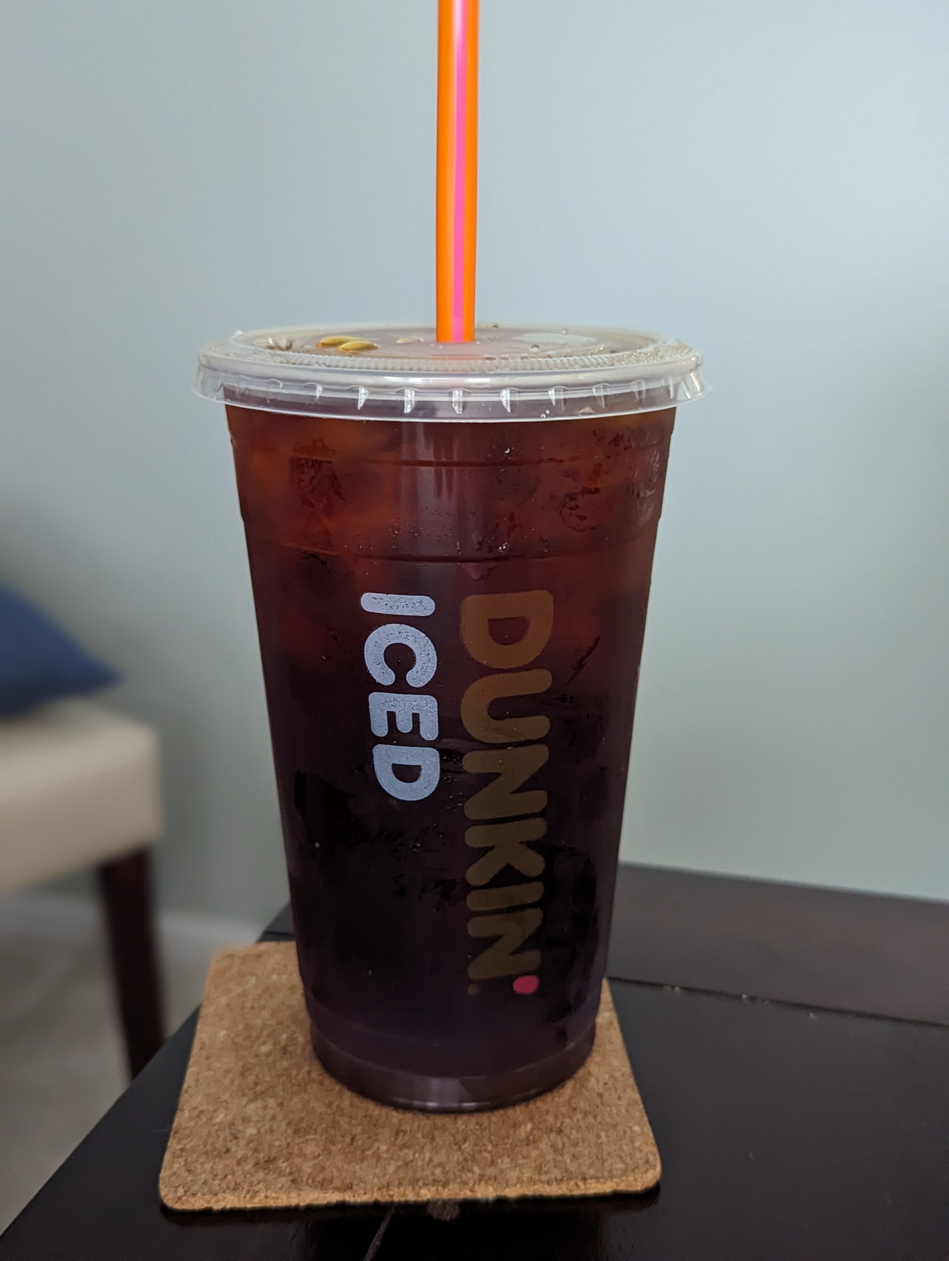 Enjoying a free iced coffee on a busy Saturday