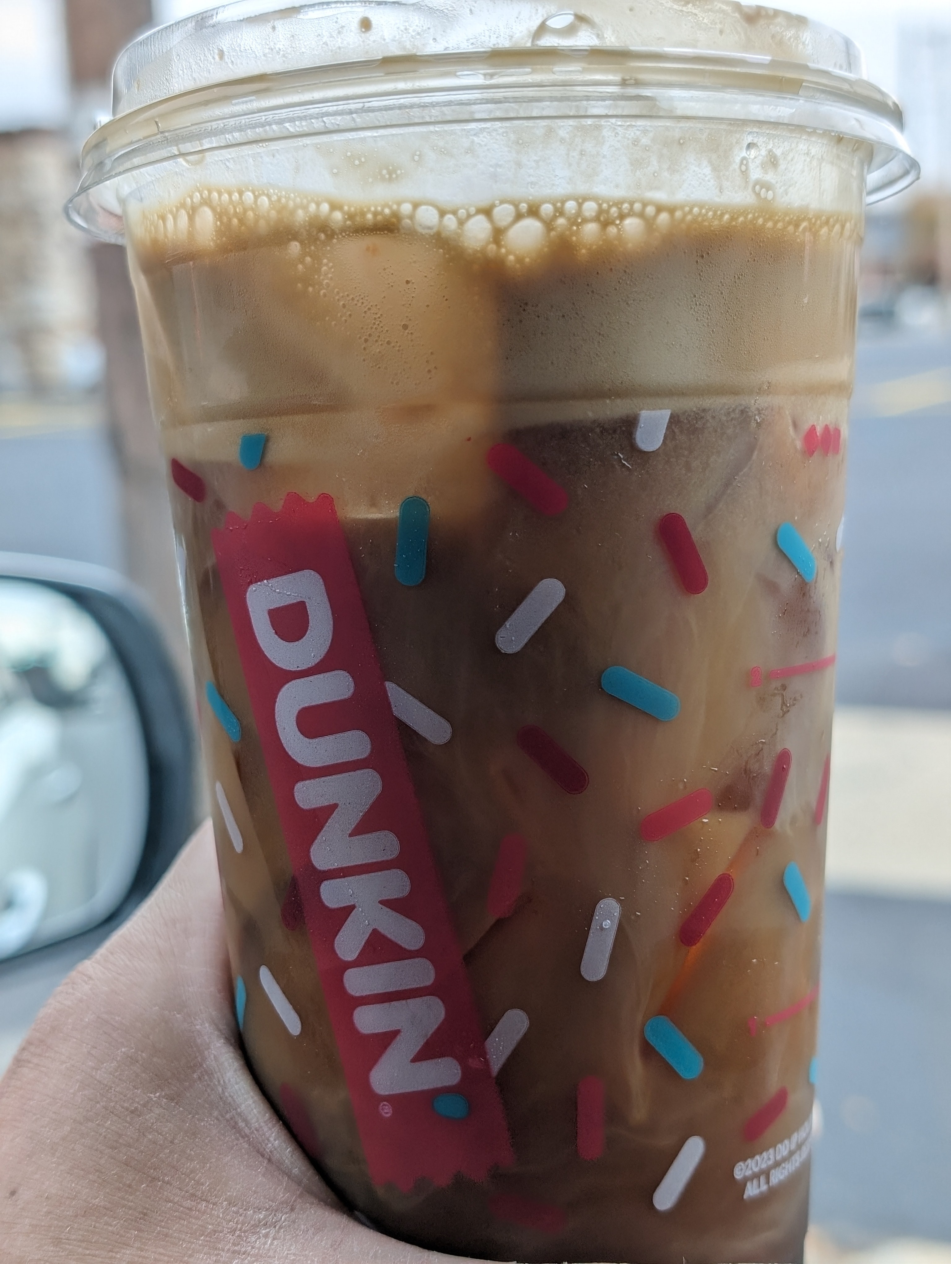 Enjoying a cookie butter cold brew on a long drive