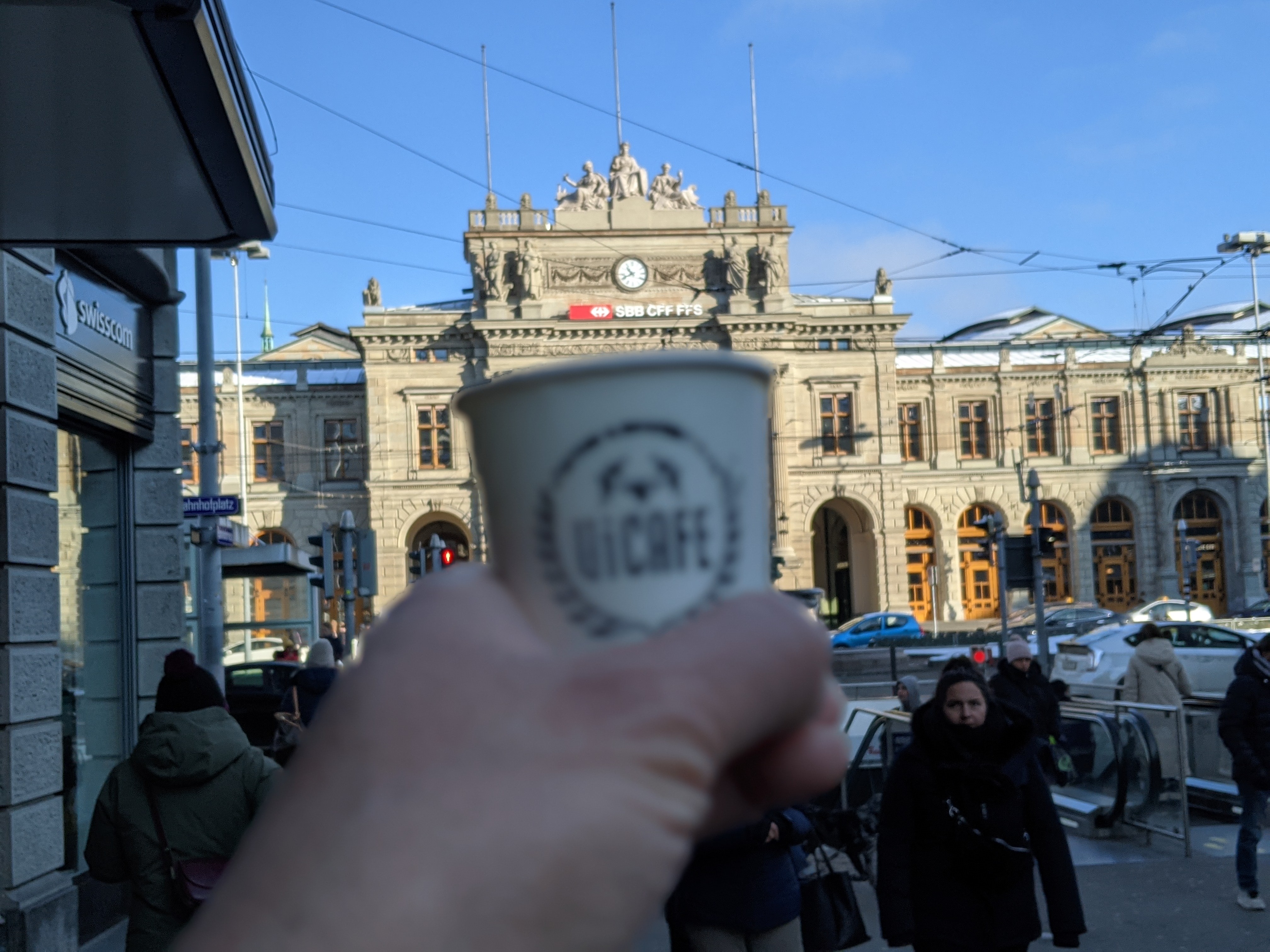 Having a doppio outside of Zurich train station