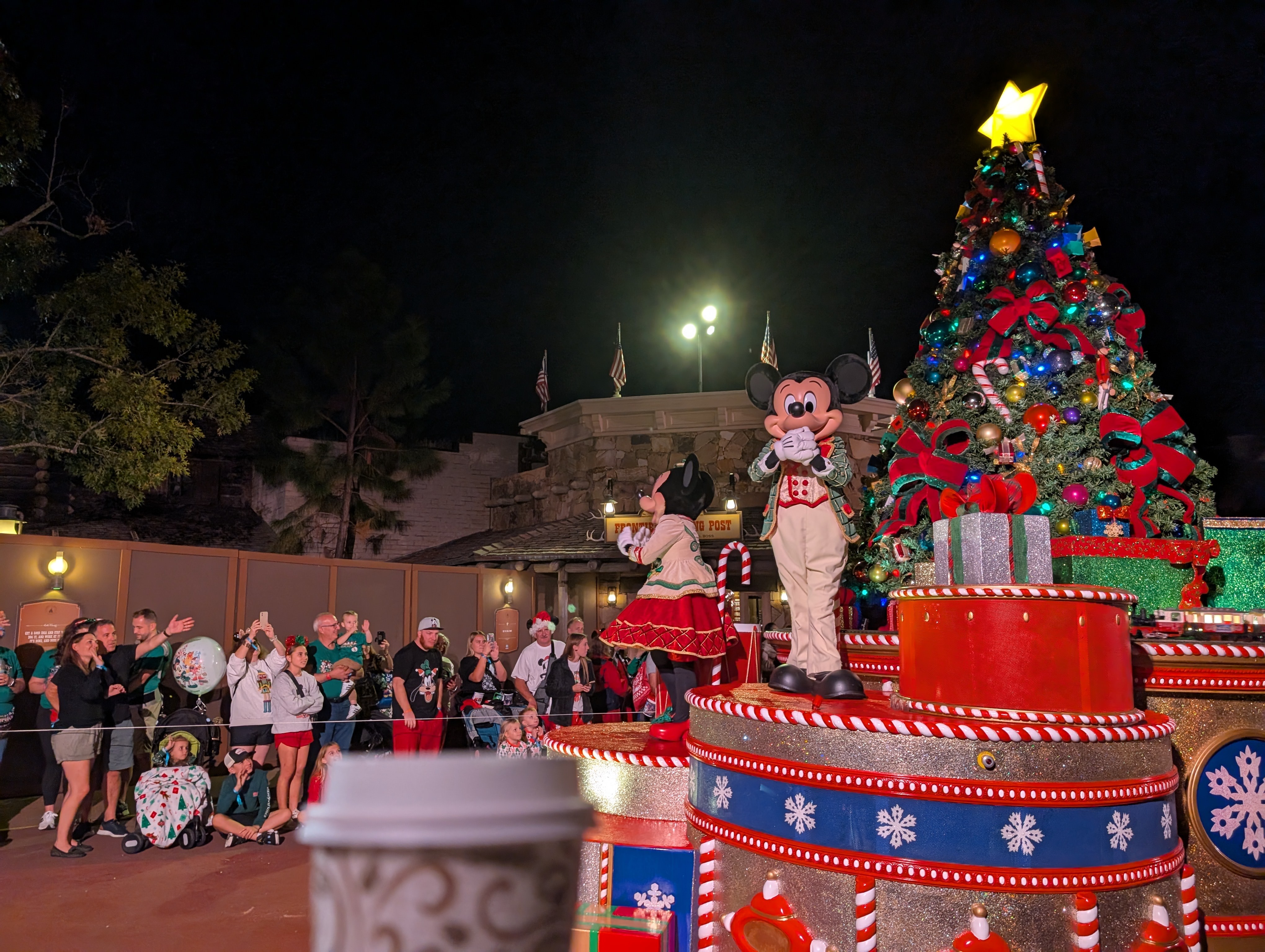 Enjoying a hot chocolate during the Christmas parade