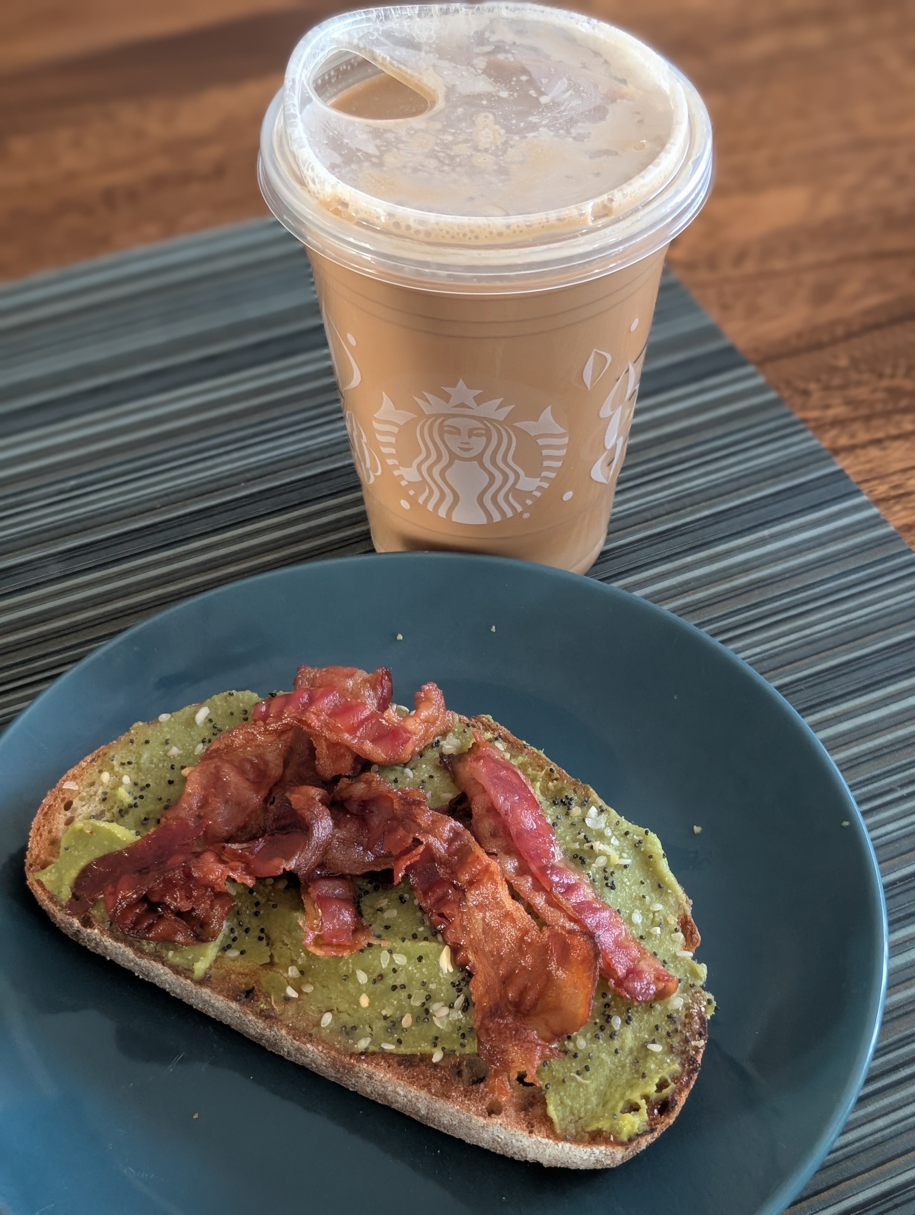 Enjoying an avocado toast from Dunkin (nothing fancy) with a vanilla sweet cream nitro cold brew on a sunny Sunday before the snow