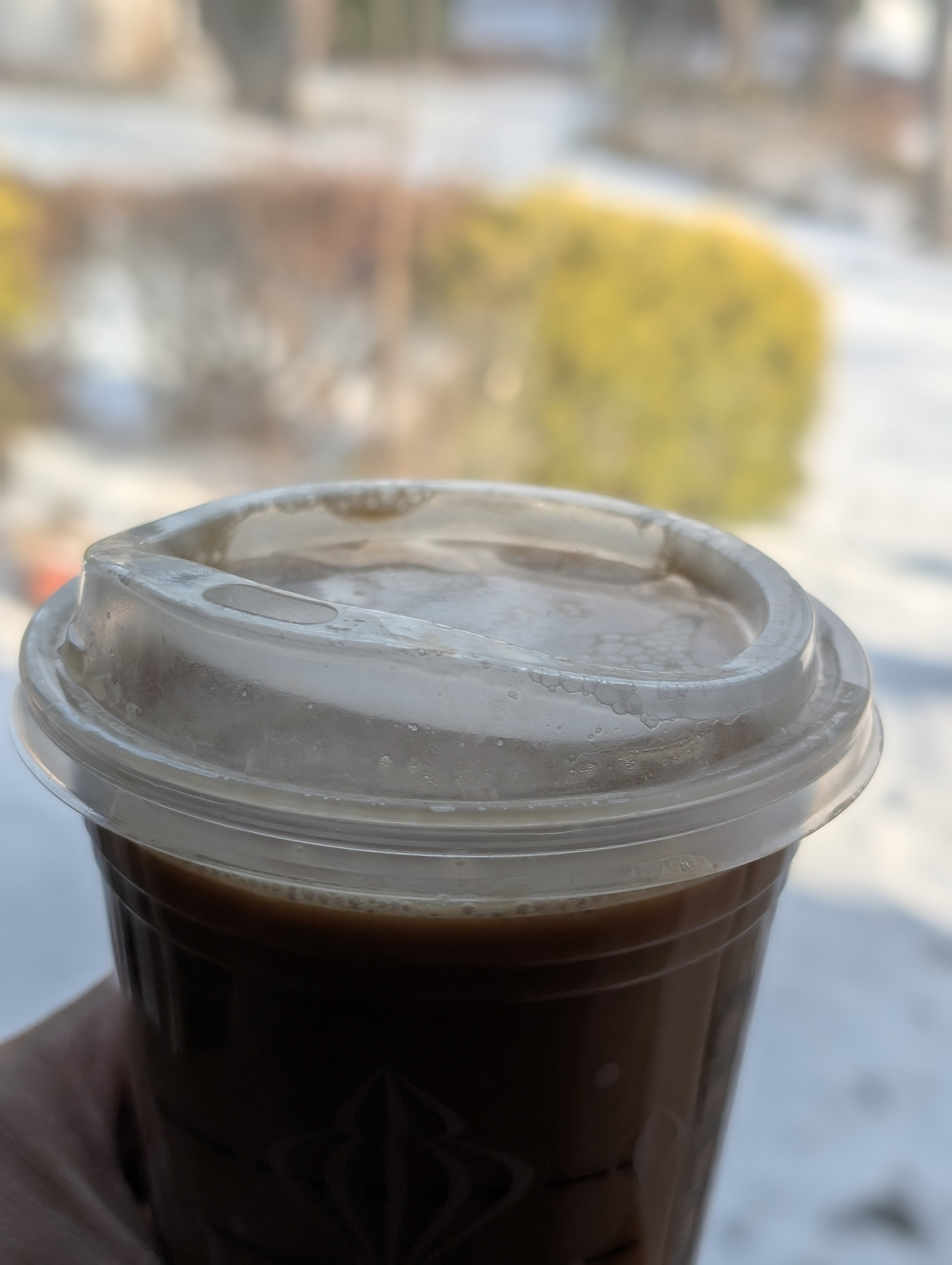 Having a vanilla sweet cream nitro cold brew on a cold Friday morning.  Even though it's sunny, it's still really cold so there's still some snow on the ground.