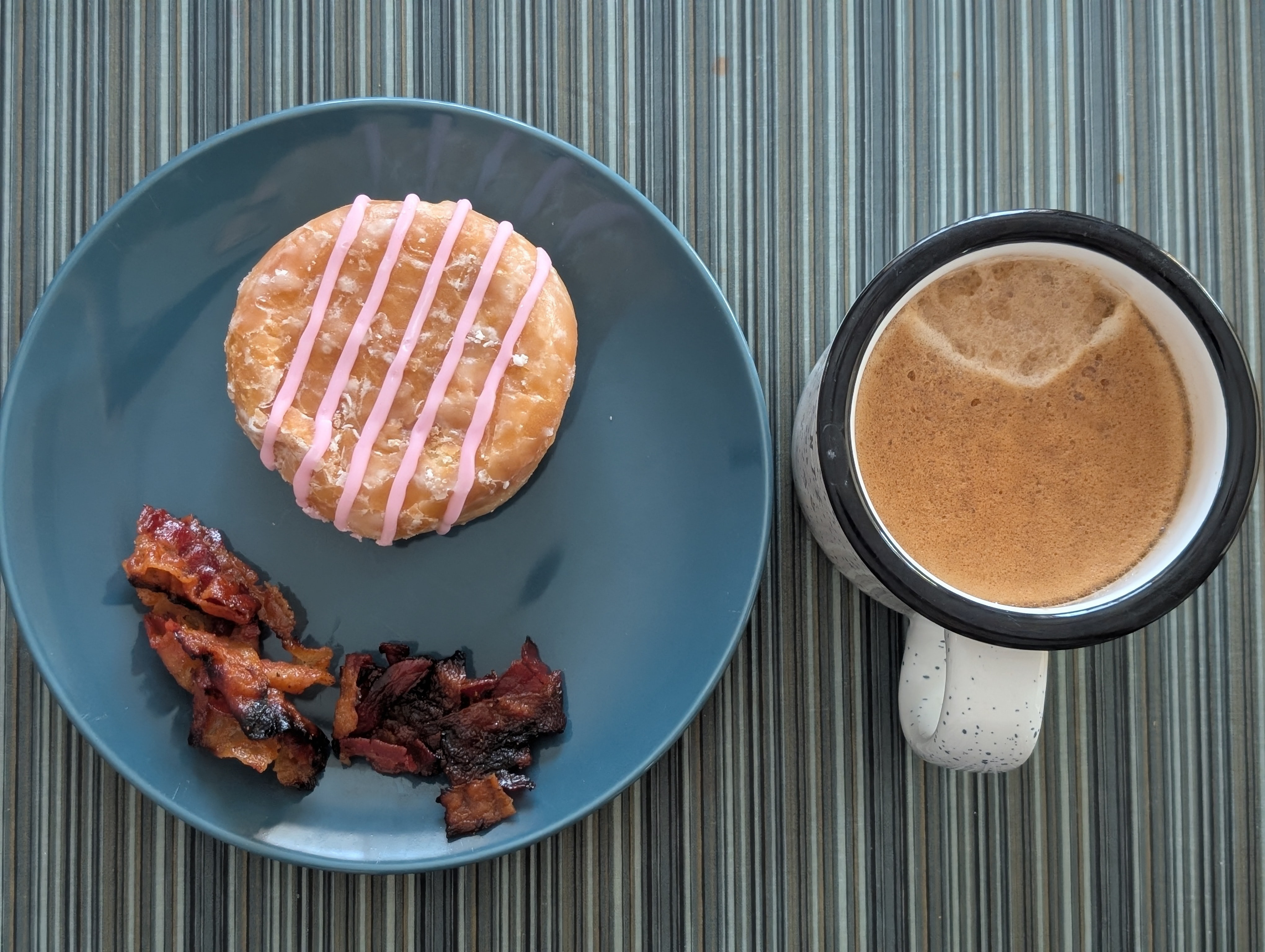 Enjoying Dunkin with a big coffee on another cold (8⁰F) morning on a day full of meetings