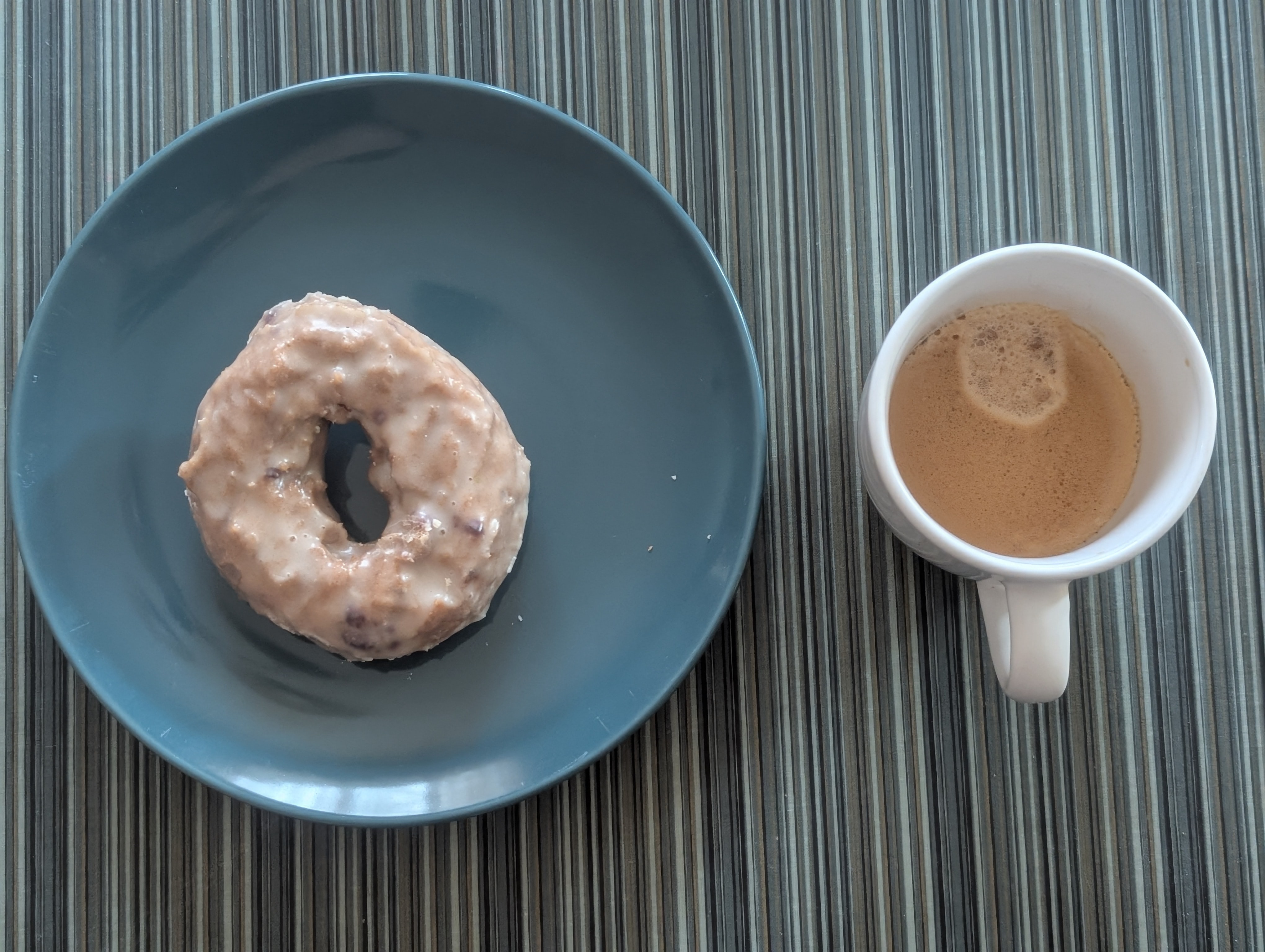 Enjoying a blueberry Krispy Kreme donut right before the next meeting