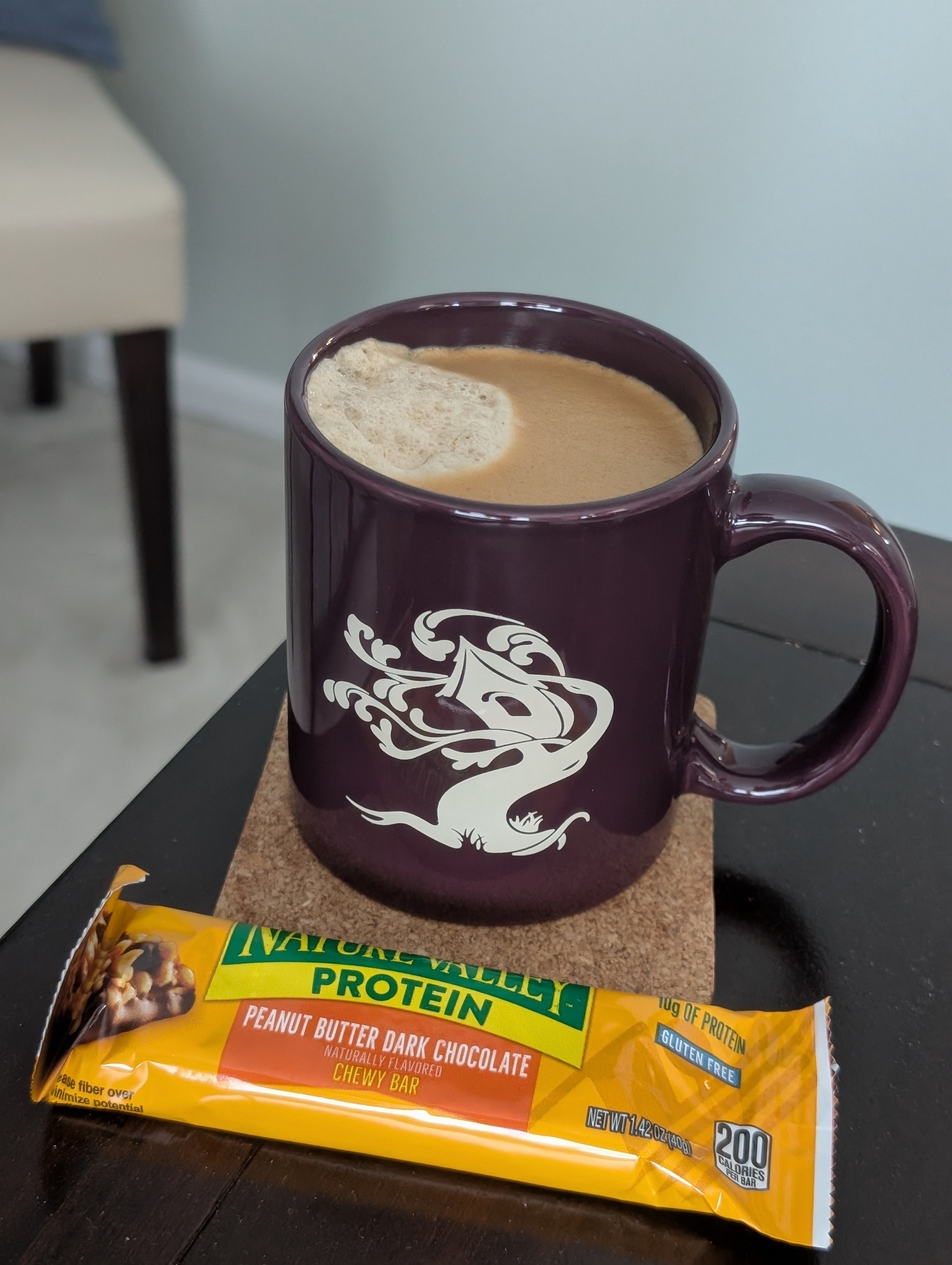 Grabbing a coffee and a bar right as a meeting starts
