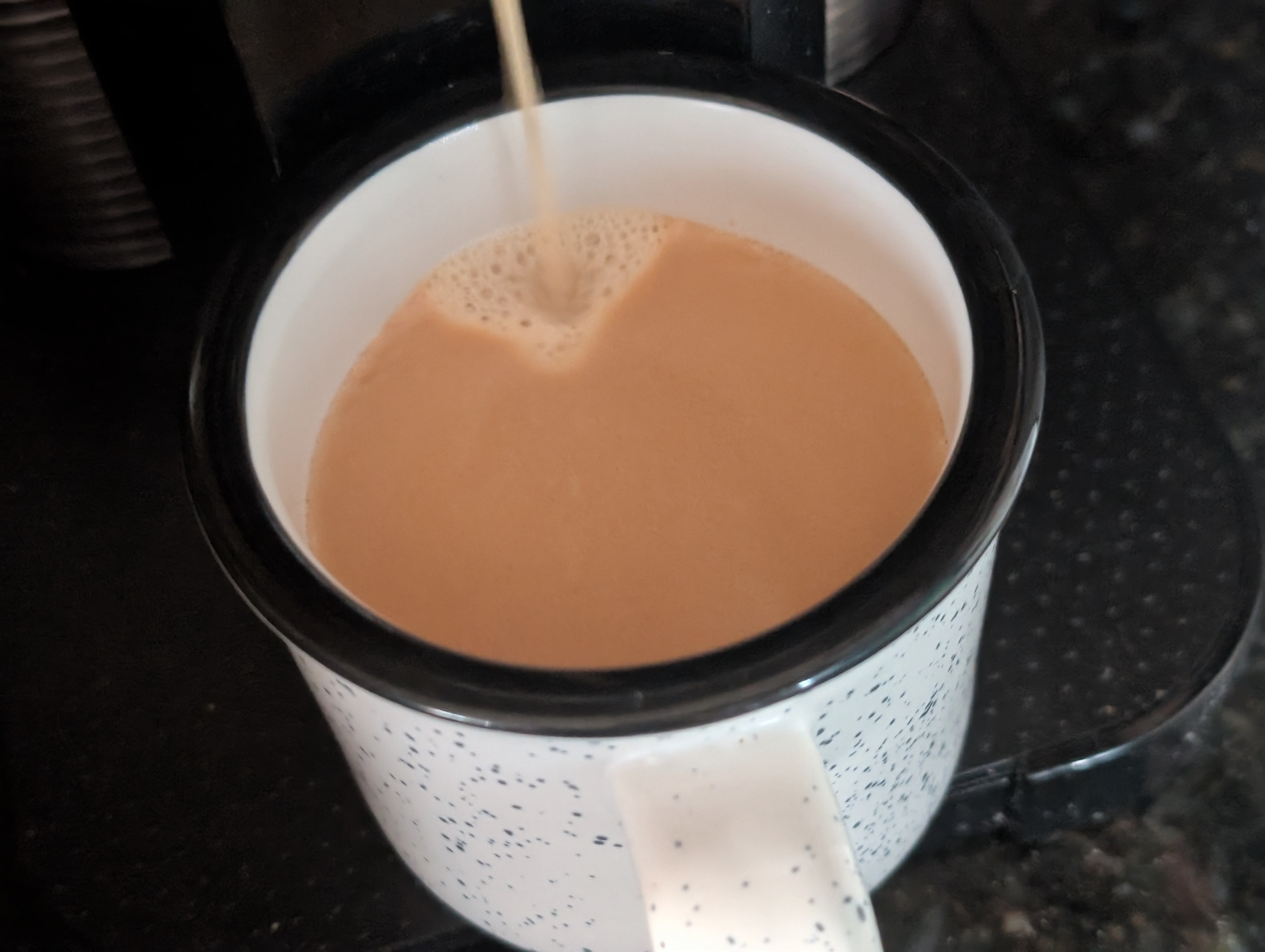 Grabbing a big coffee right before the first meeting of the day
