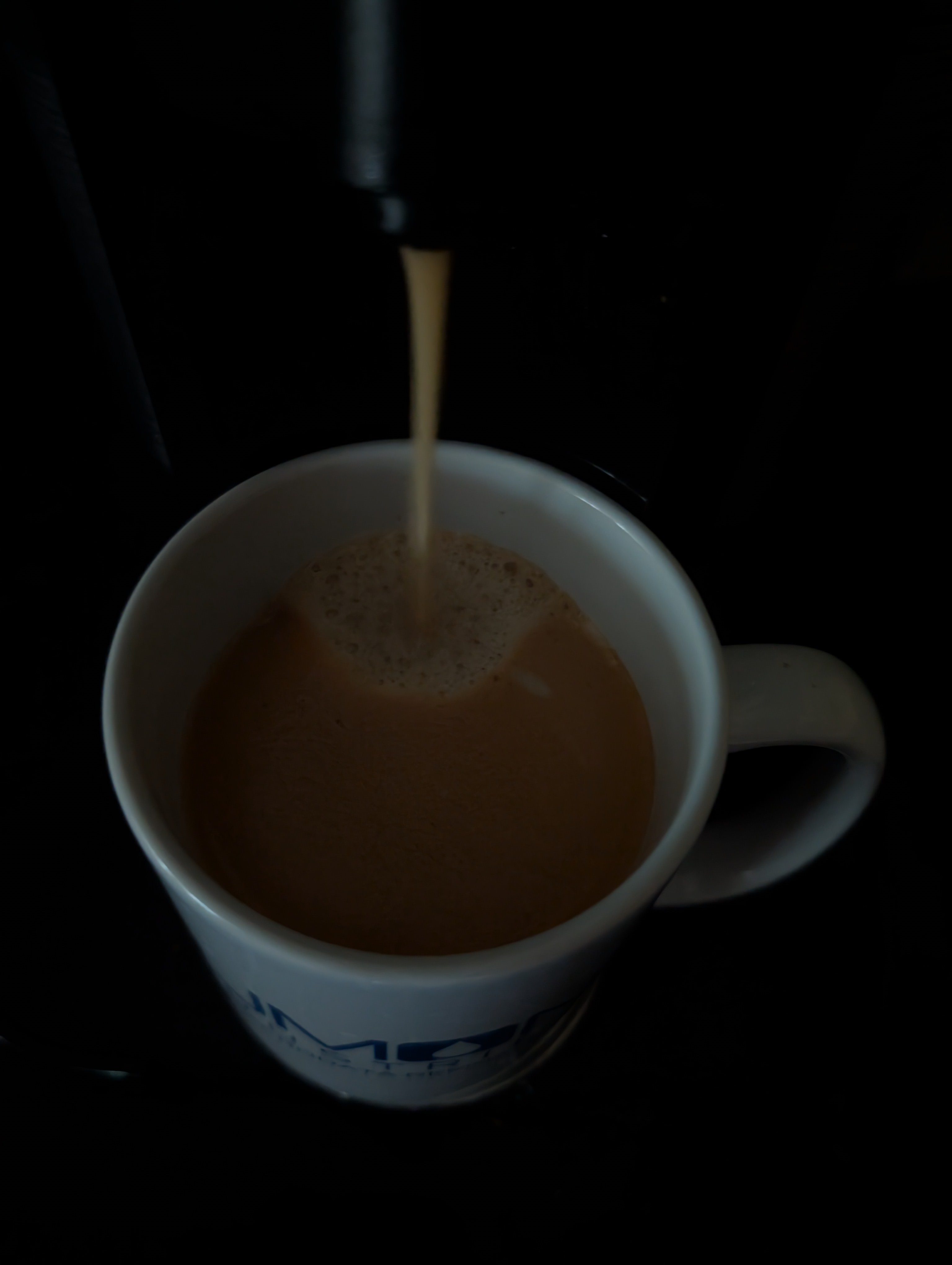 Grabbing a coffee on another overcast and rainy day of meetings