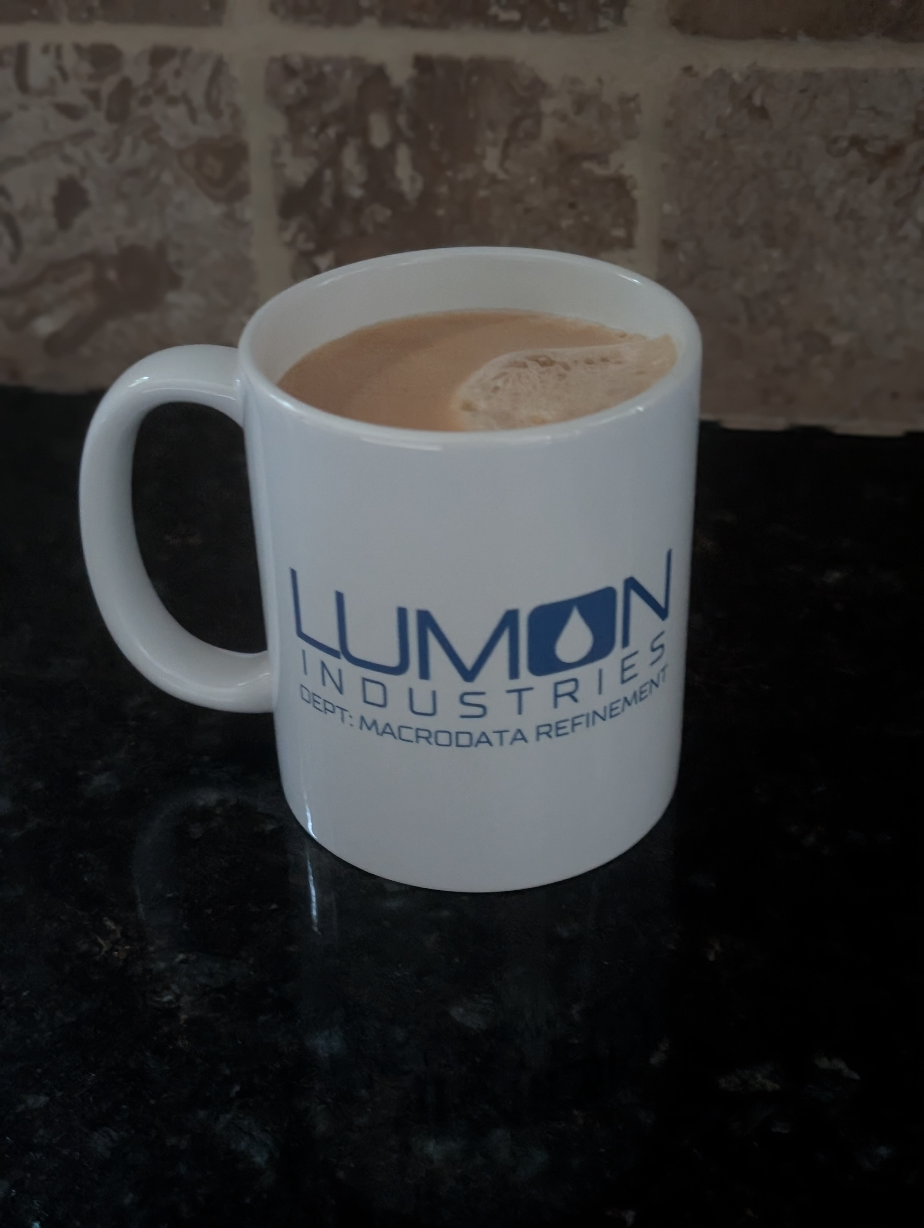 Grabbing a coffee right before the first meeting of the day on a cool (finally) and overcast rainy Friday.