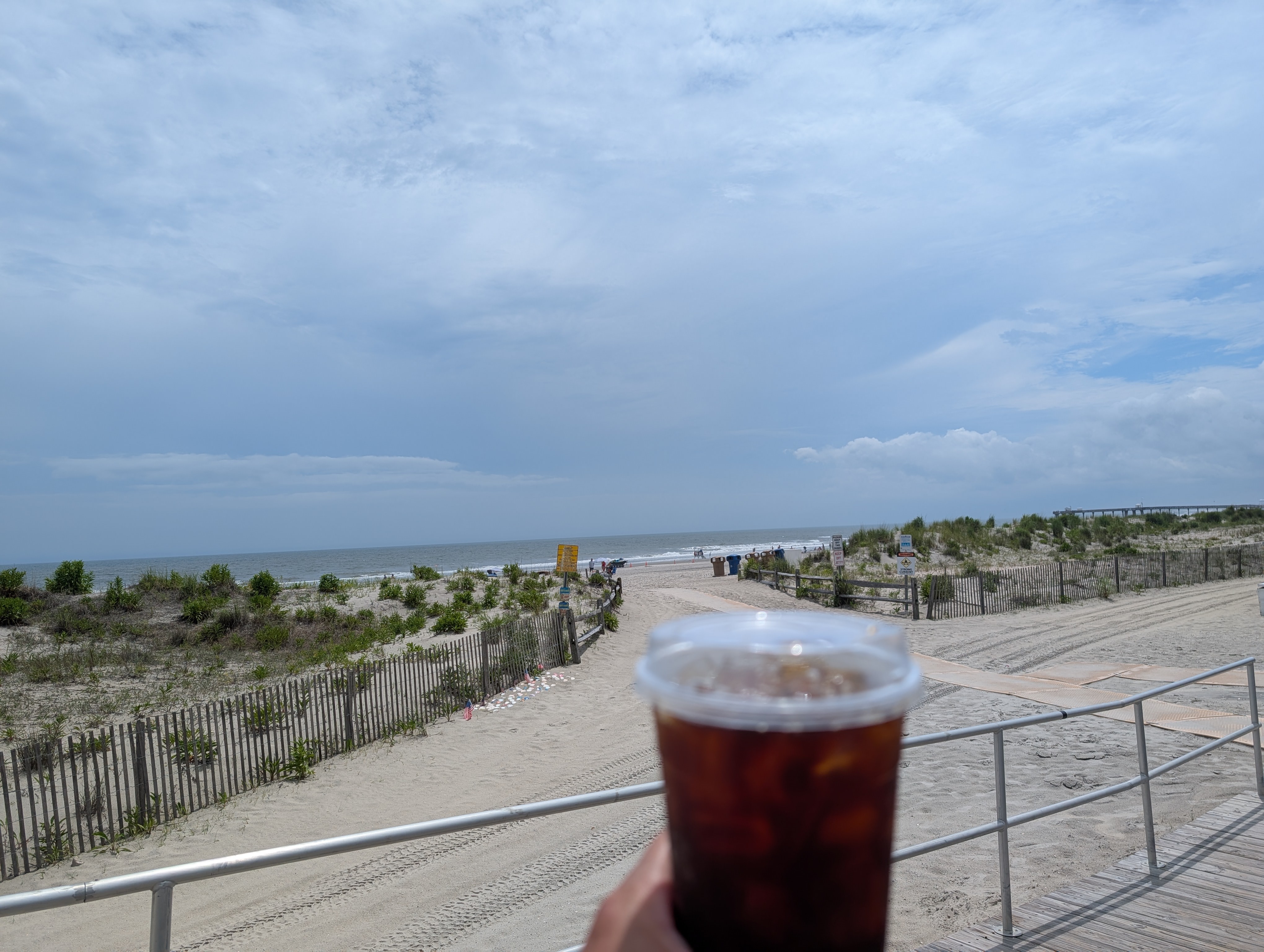 Having a regular cold brew while walking the boardwalk