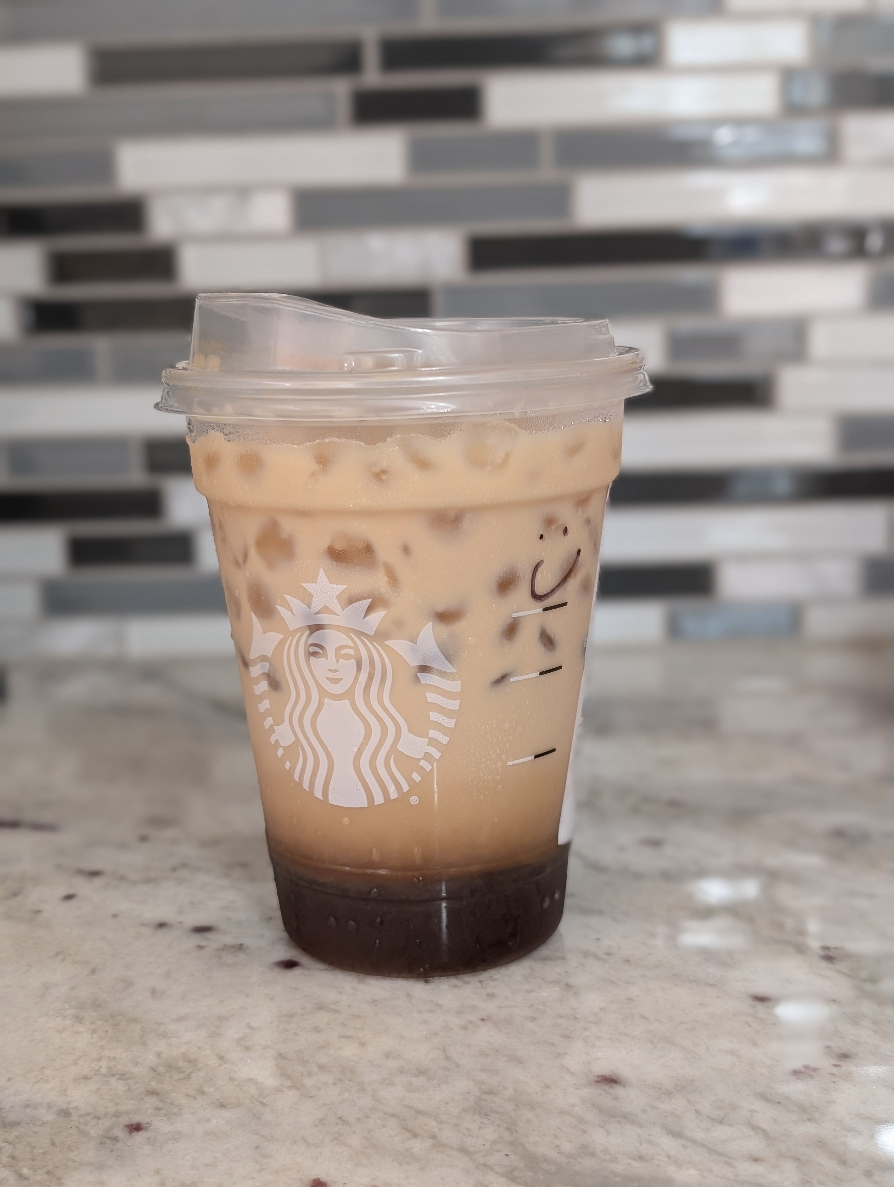 Having a hazelnut oak milk shaken ice espresso before heading to the beach for the day