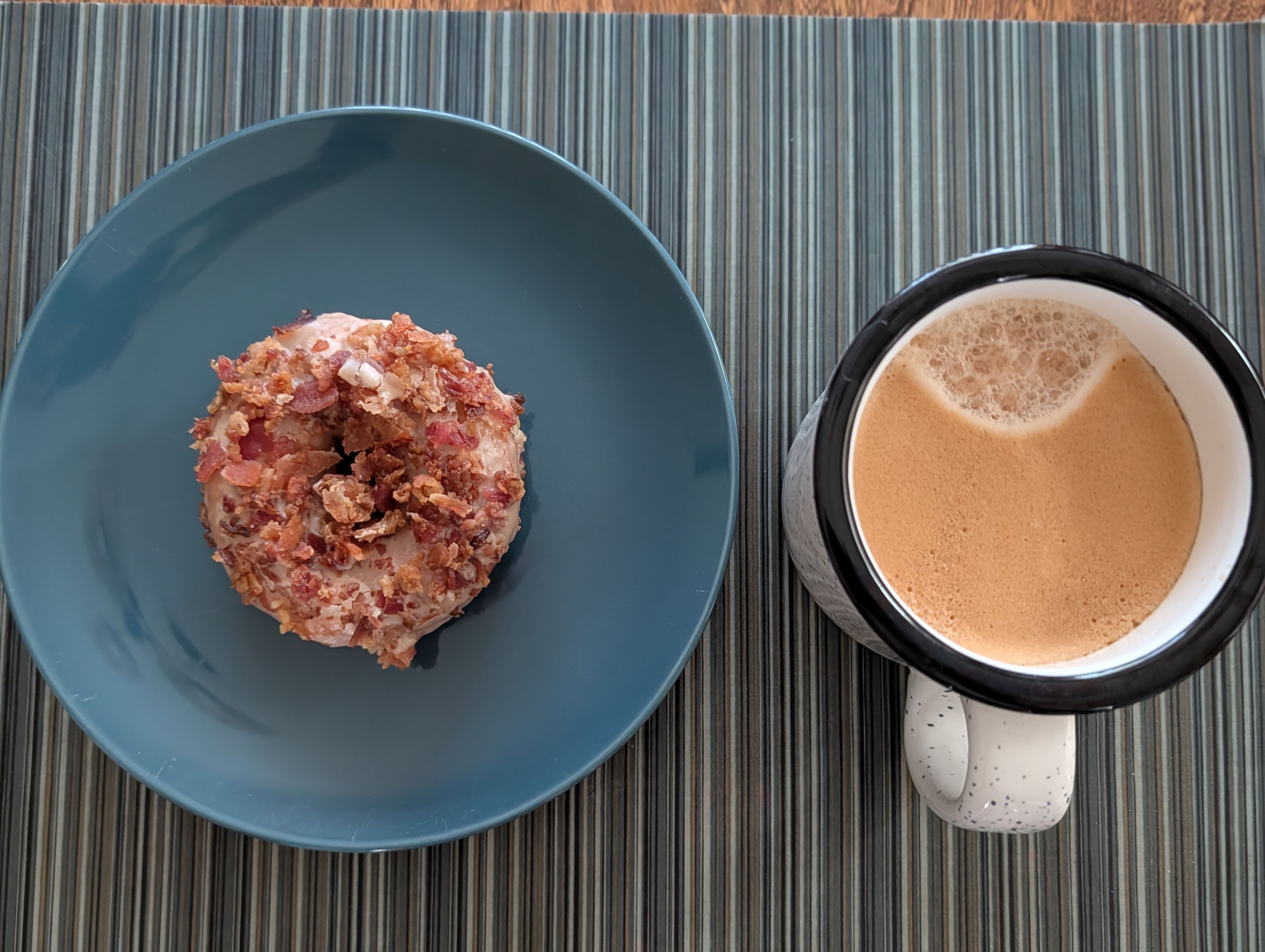 Enjoying a maple bacon Duck Donut with a coffee on a late lazy Sunday