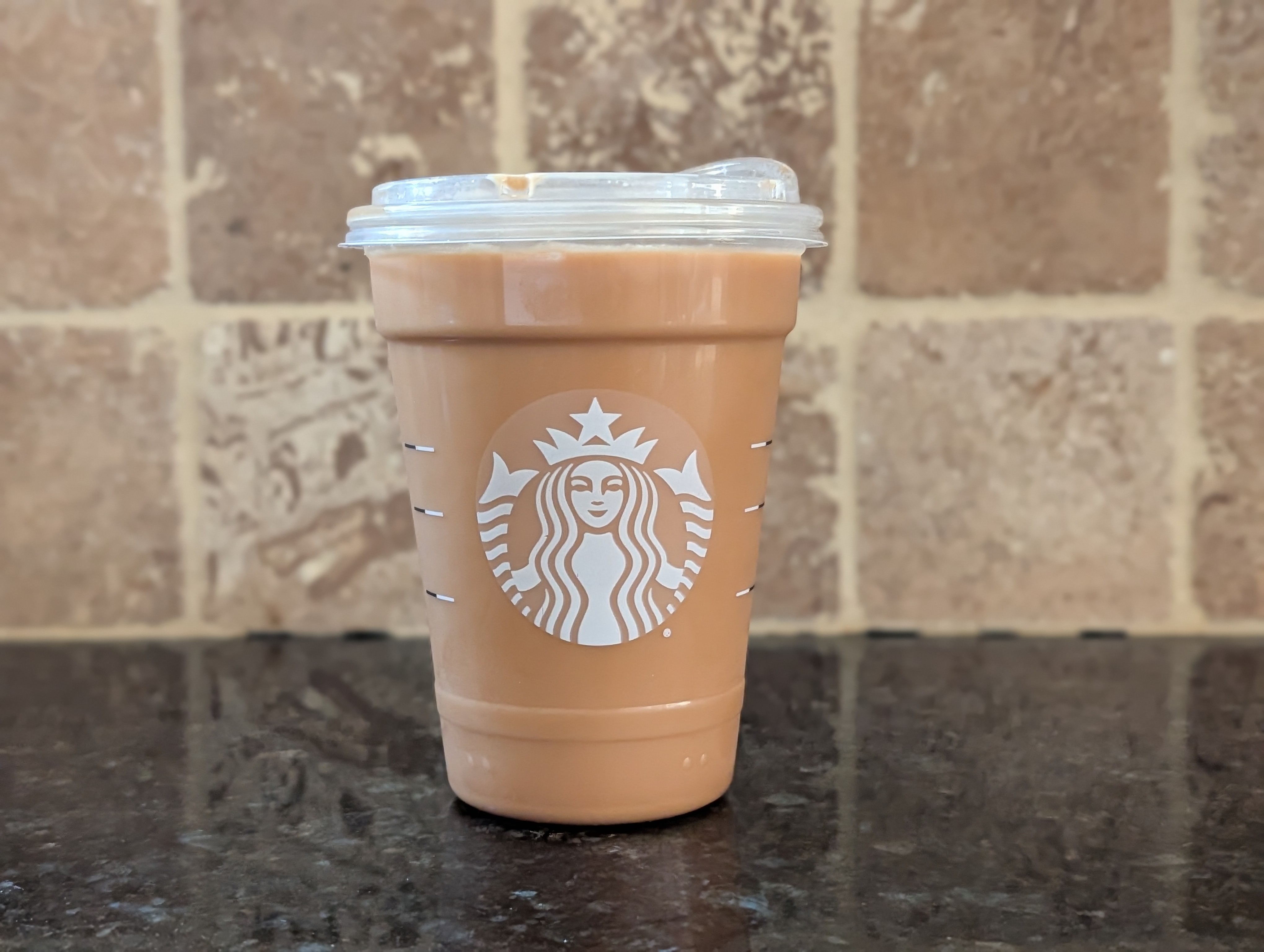 Enjoying a vanilla sweet cream nitro cold brew at home before heading in to the office for meetings