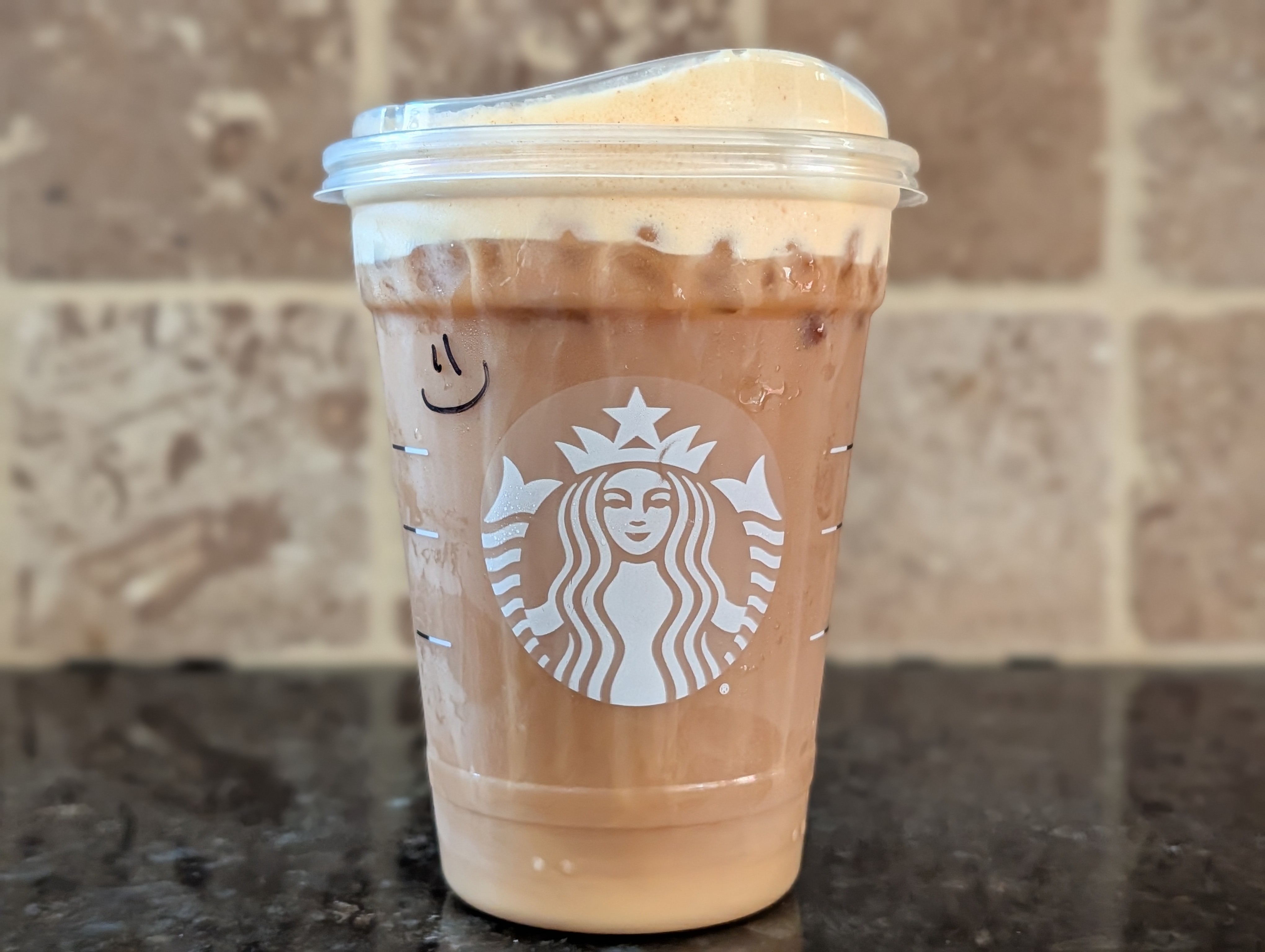 Enjoying a pumpkin cream cold brew before playing some pickleball