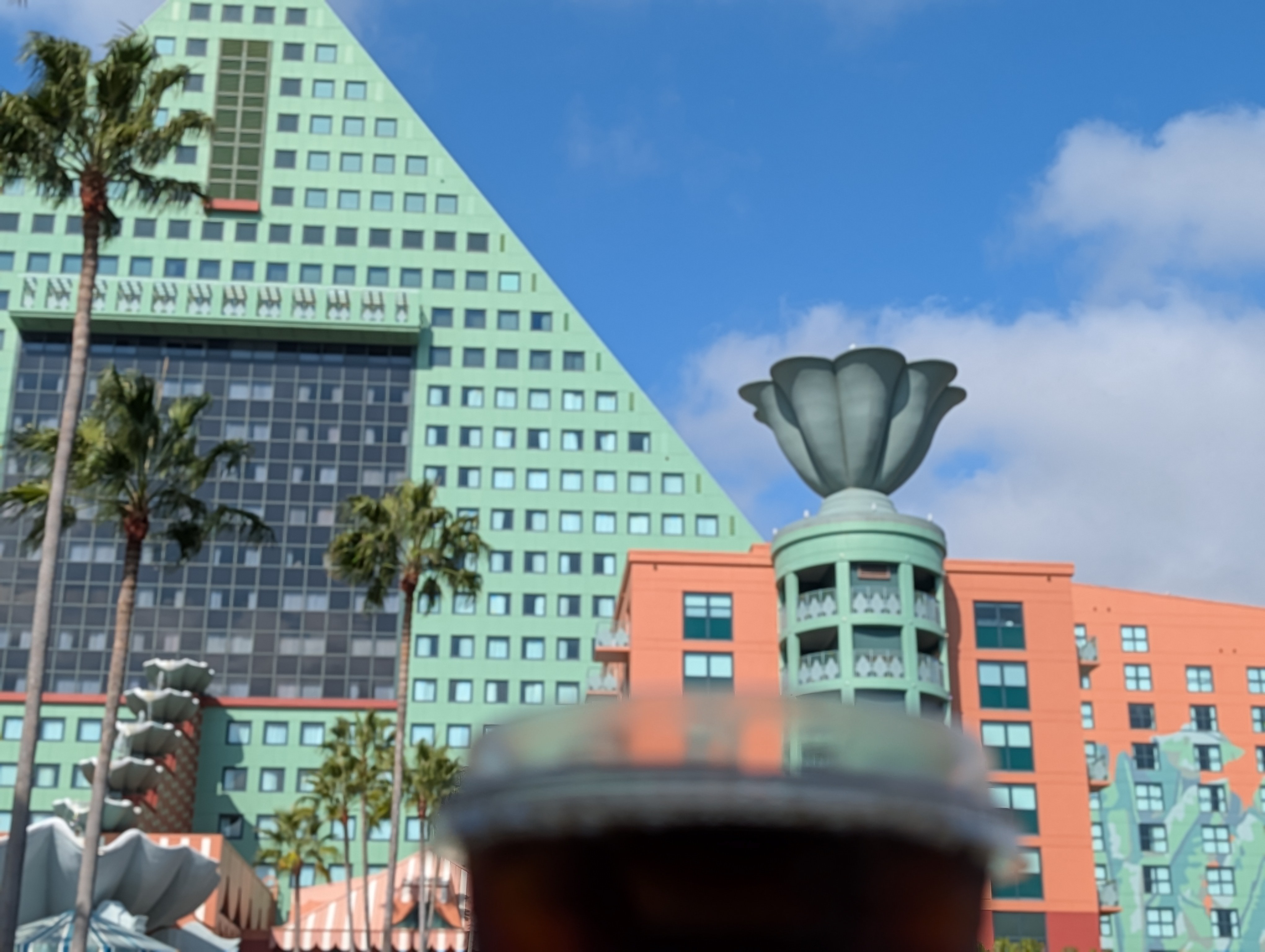 having a cold brew while waiting for the boat for Epcot