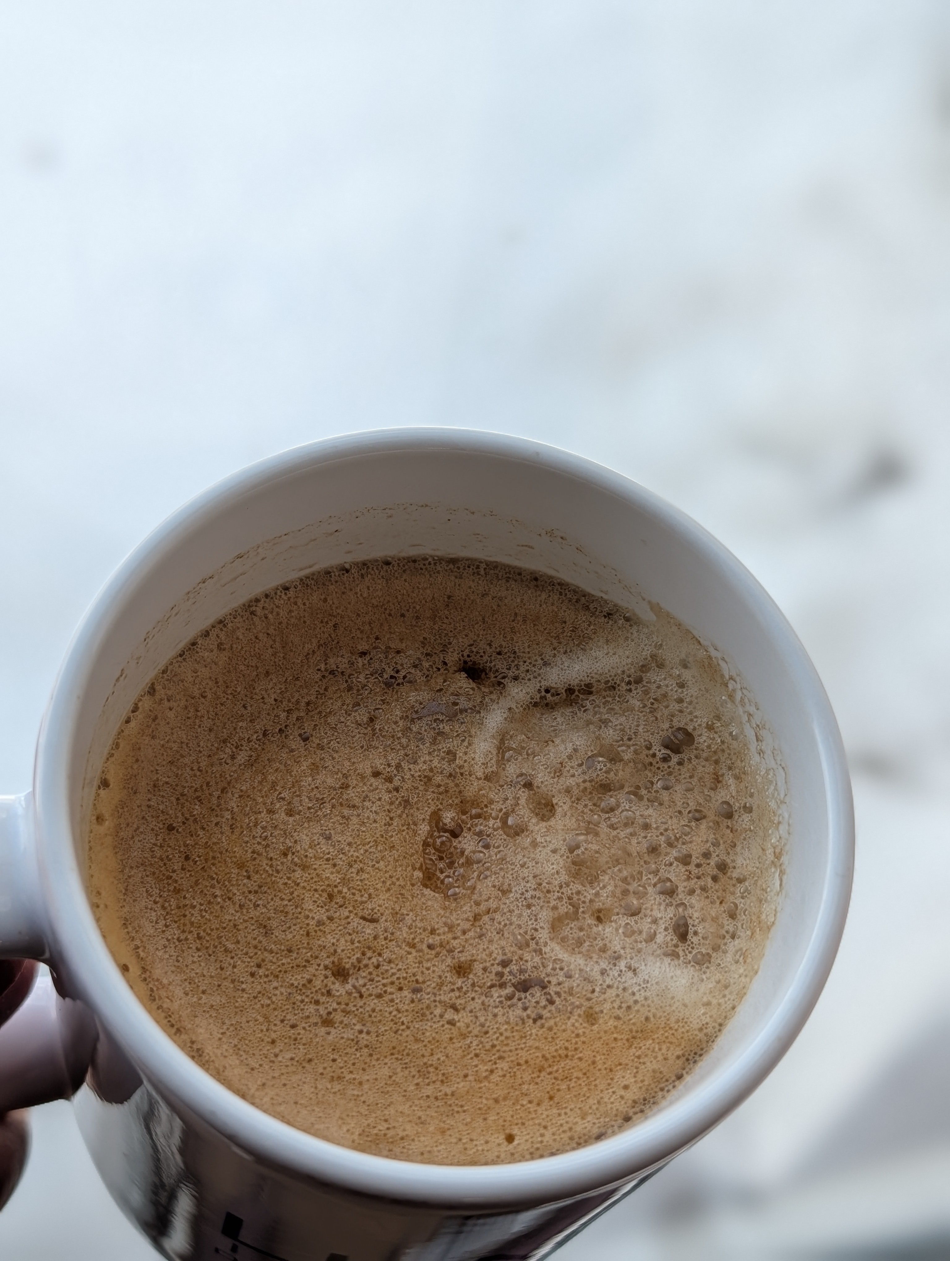 Grabbing a coffee between meetings and checking out the snow that won't go away due to a big snowstorm forecasted for this weekend